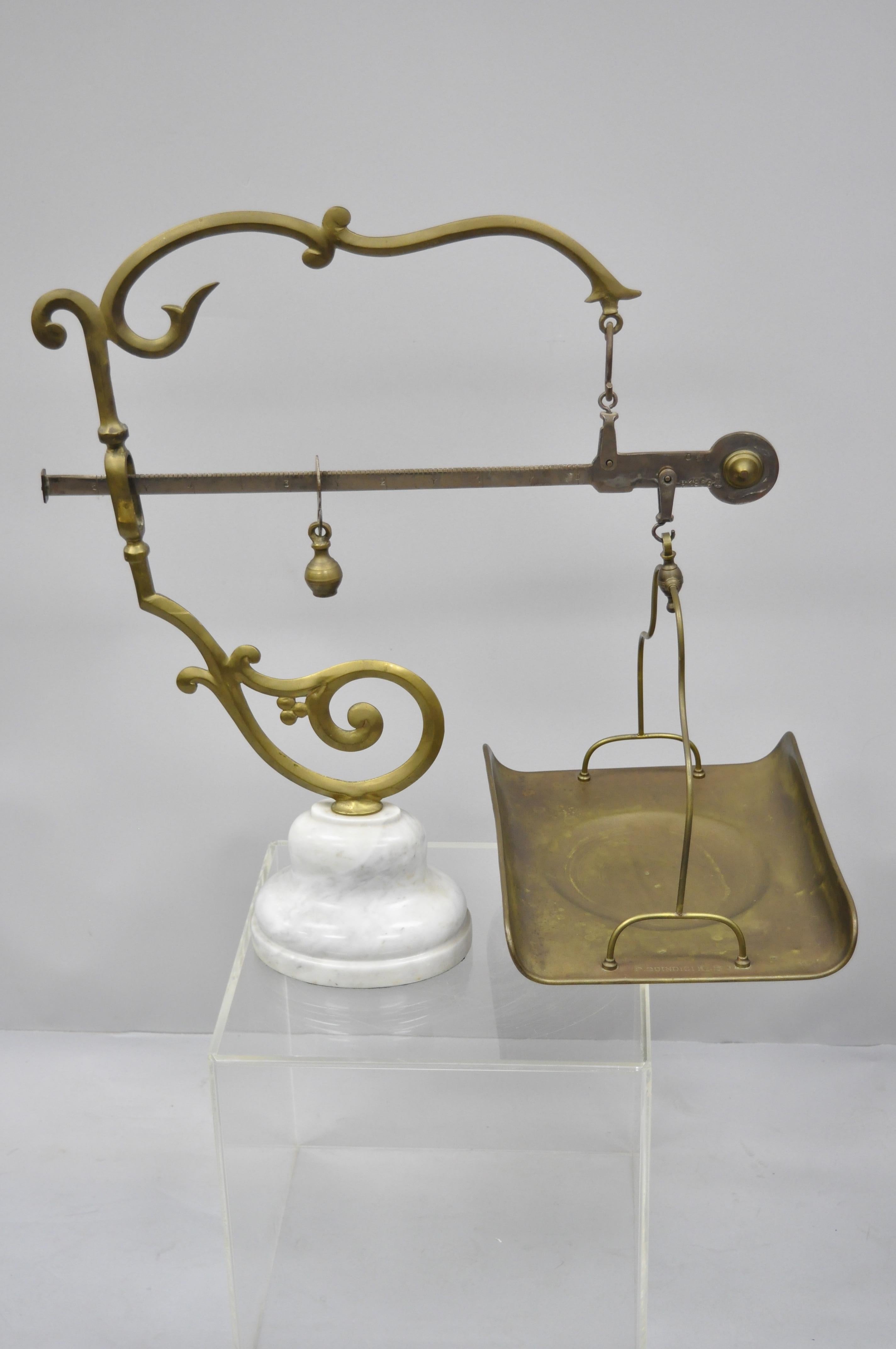 P. Quindici 19th century Chilog Balance scale brass and marble. Item featurtes marble base, ornate brass frame, balance weight, removable tray, stamp to tray reads 