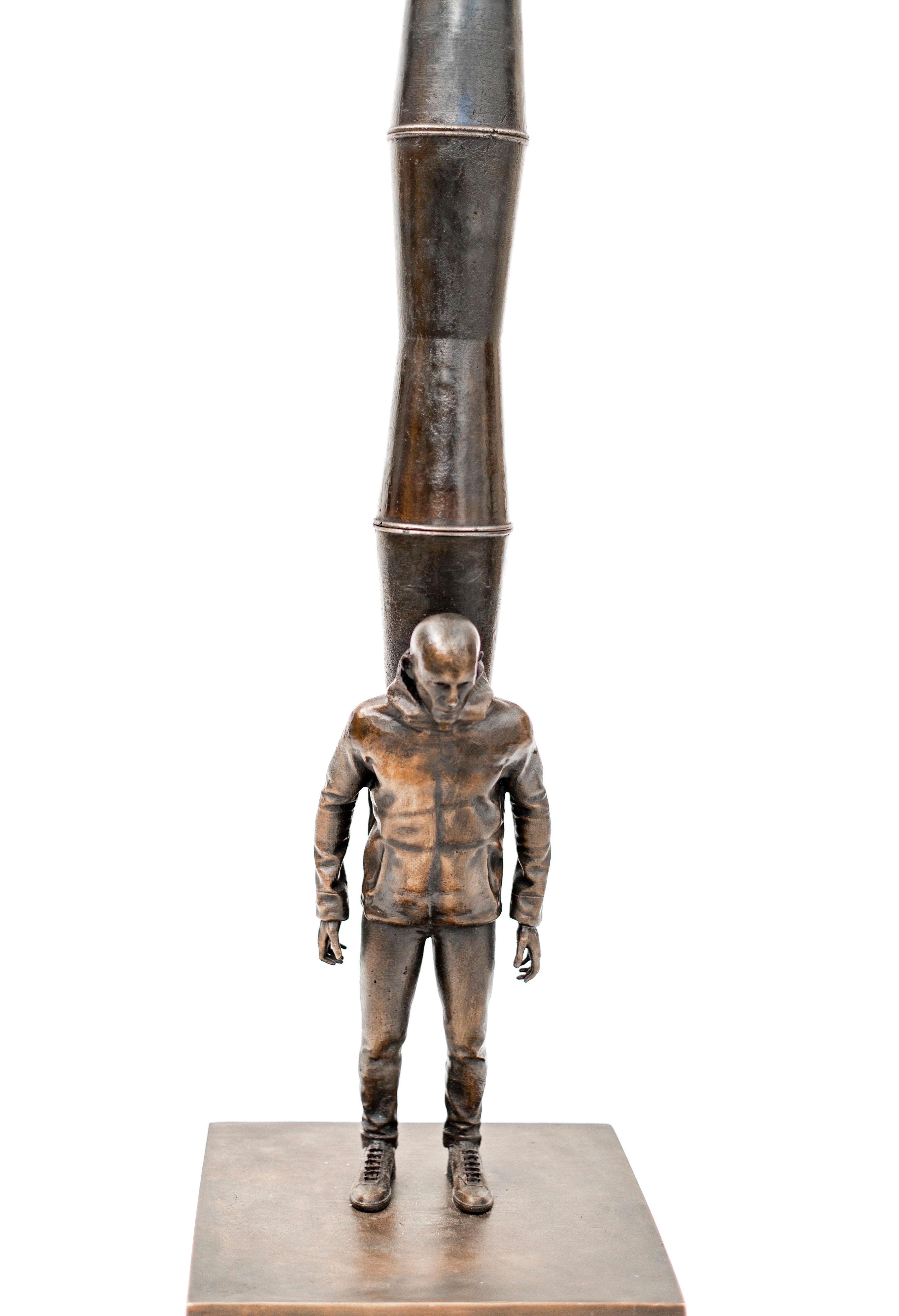 Daily Grind - Patinated bronze cups stacked on a male figure 