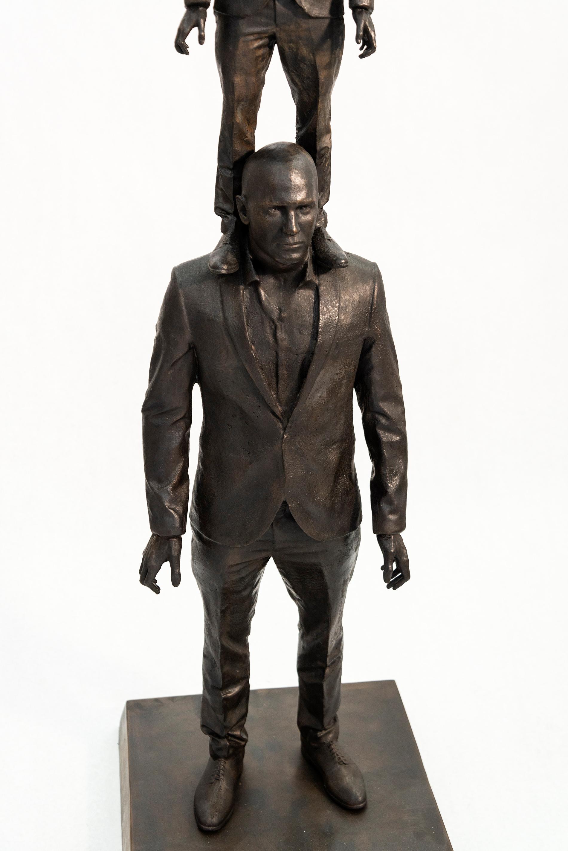 This piece is available by commission, please inquire for lead time.

Roch Smith’s inspired bronze sculpture is a clever ‘play’ on a popular saying. “If I have seen further, it is by standing on the shoulders of giants,” (Sir Isaac Newton) This