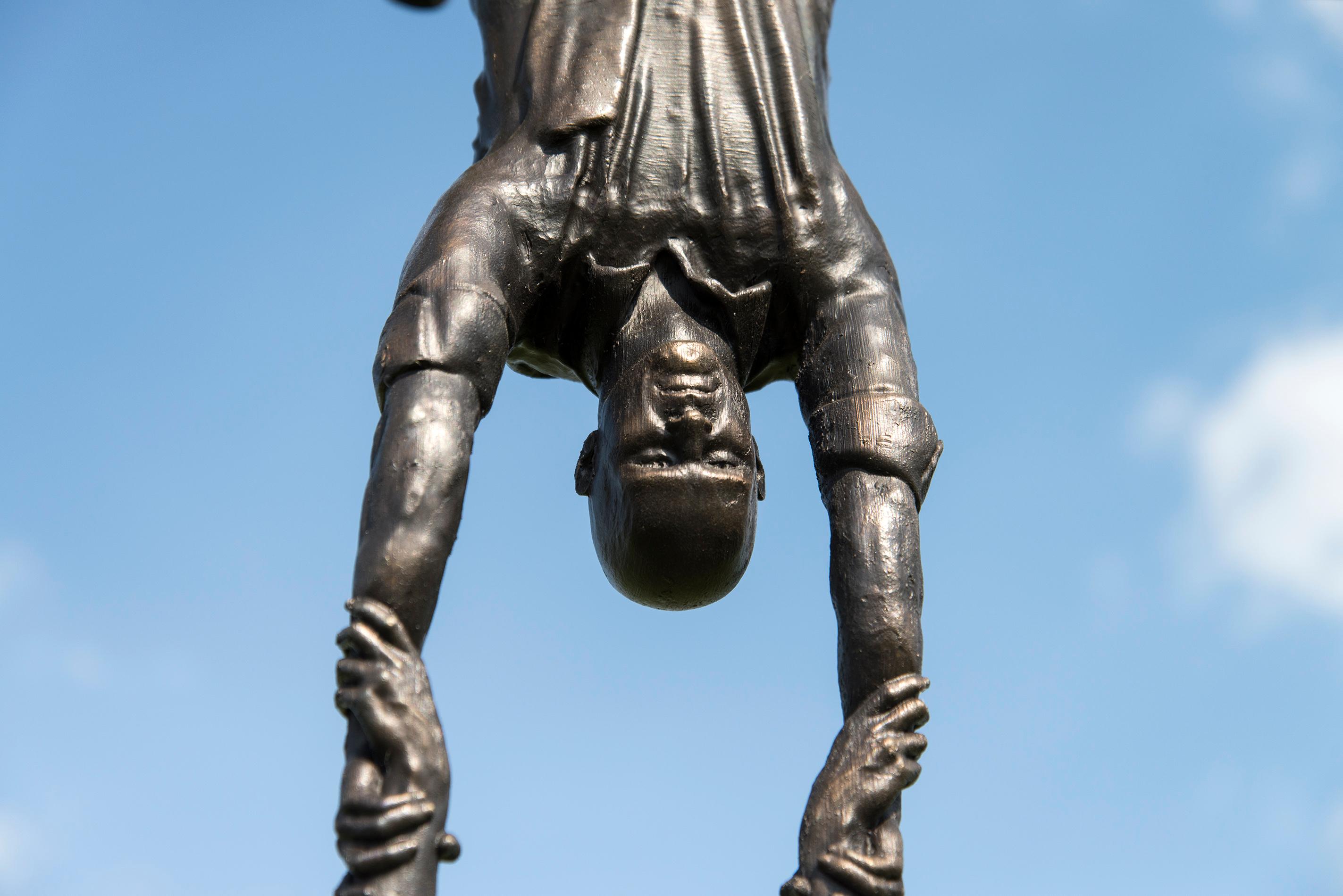 Hold Fast - tall, surrealist, male, figurative, bronze, steel, outdoor sculpture 6