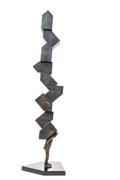 Maisons de mémoire - Figure masculine patinée et maisons de forme empilée