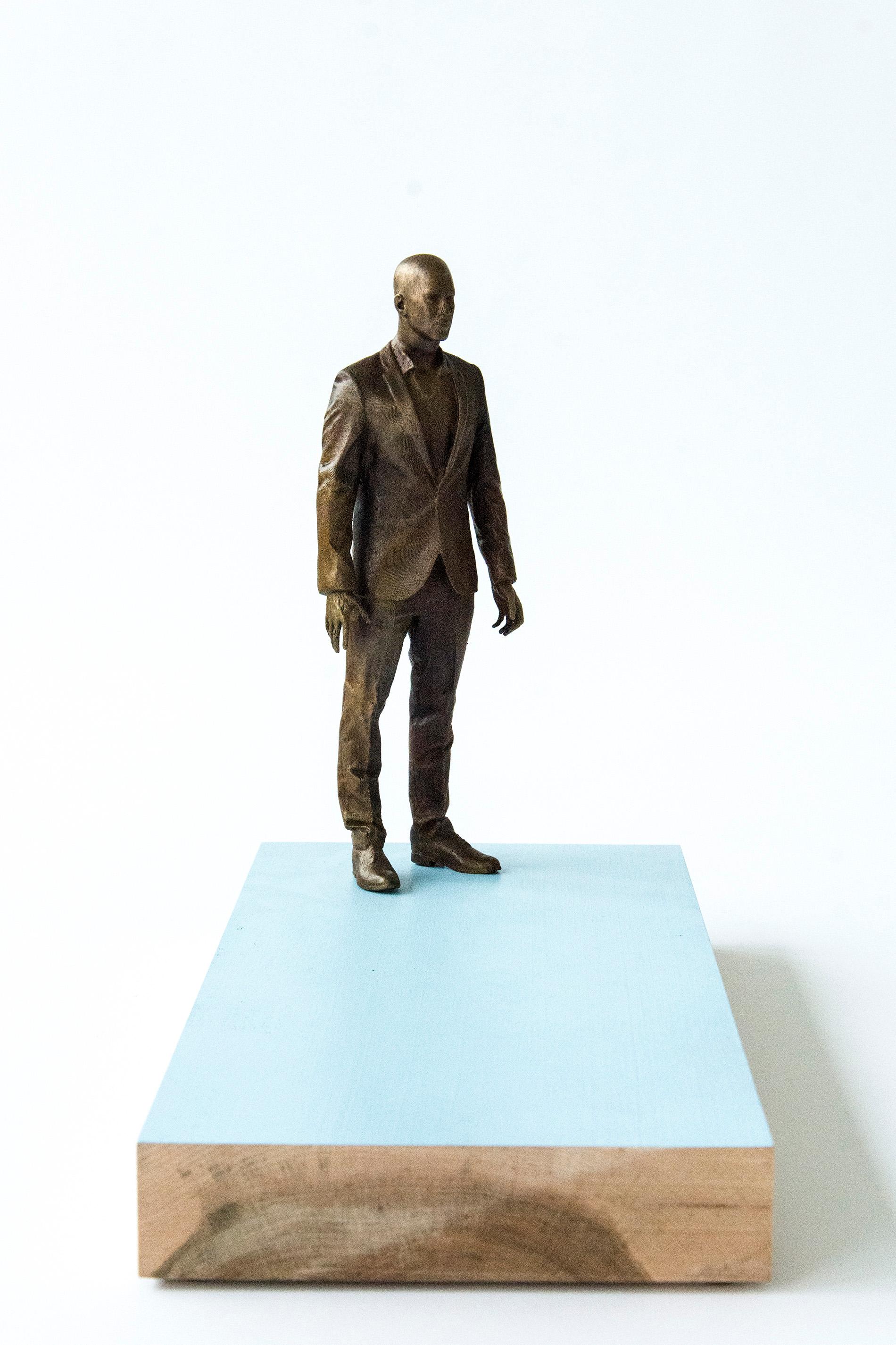 Roch Smith Figurative Sculpture - Ponder - small, narrative, figurative, male bronze sculpture on wood base