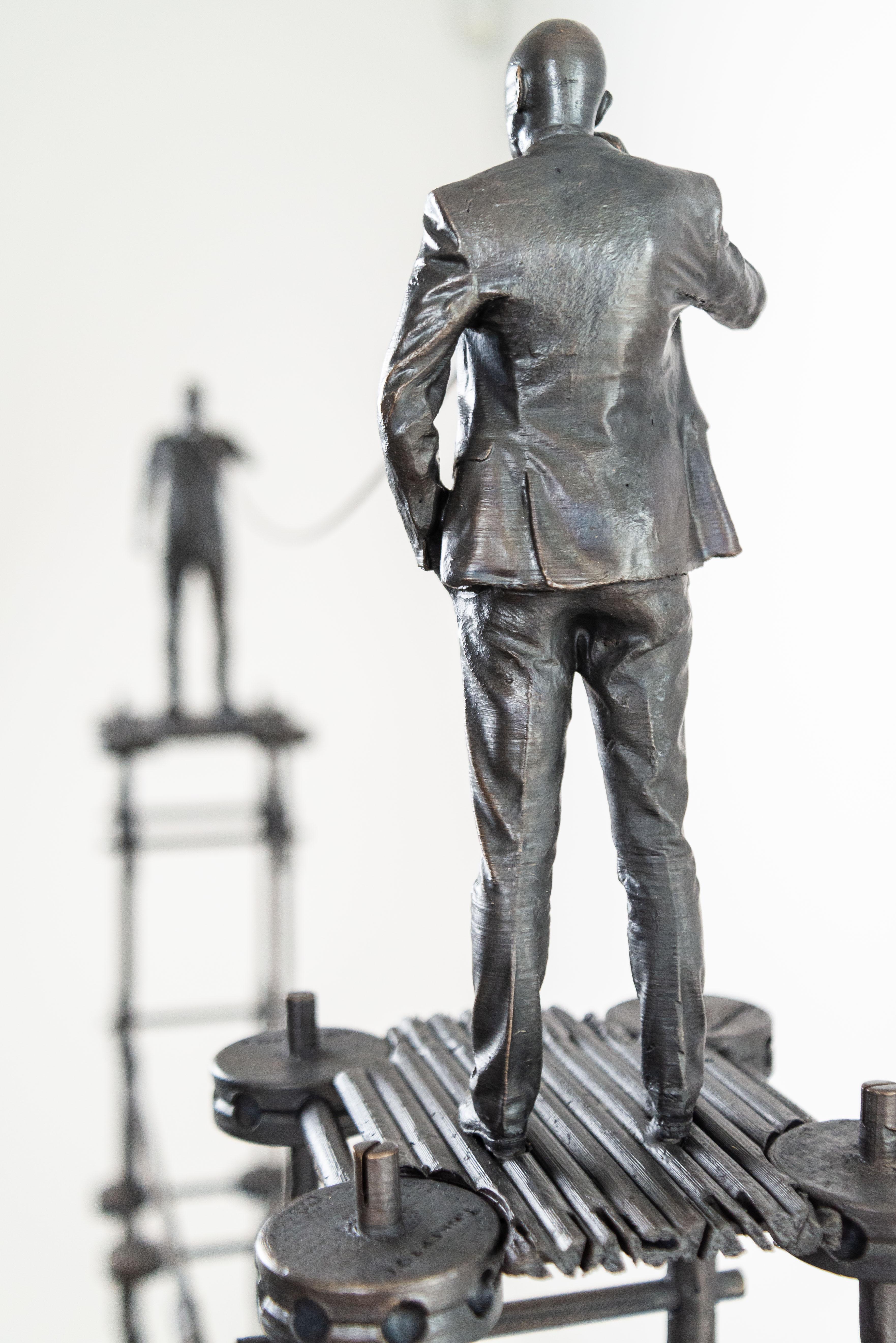Reliable Technology - tall, narrative, figurative, male, bronze sculpture 5