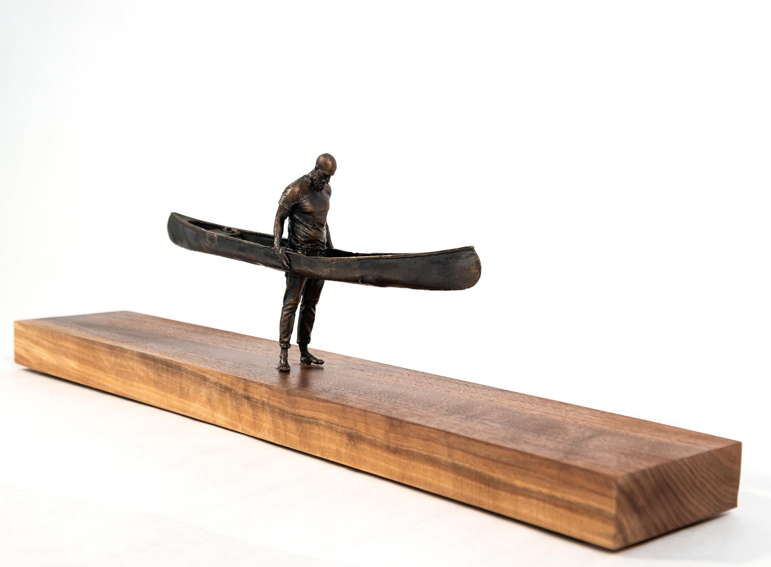 Wood 1/3 - petit, surréaliste, canoë, homme, figuratif, bois, bronze, sculpture - Sculpture de Roch Smith