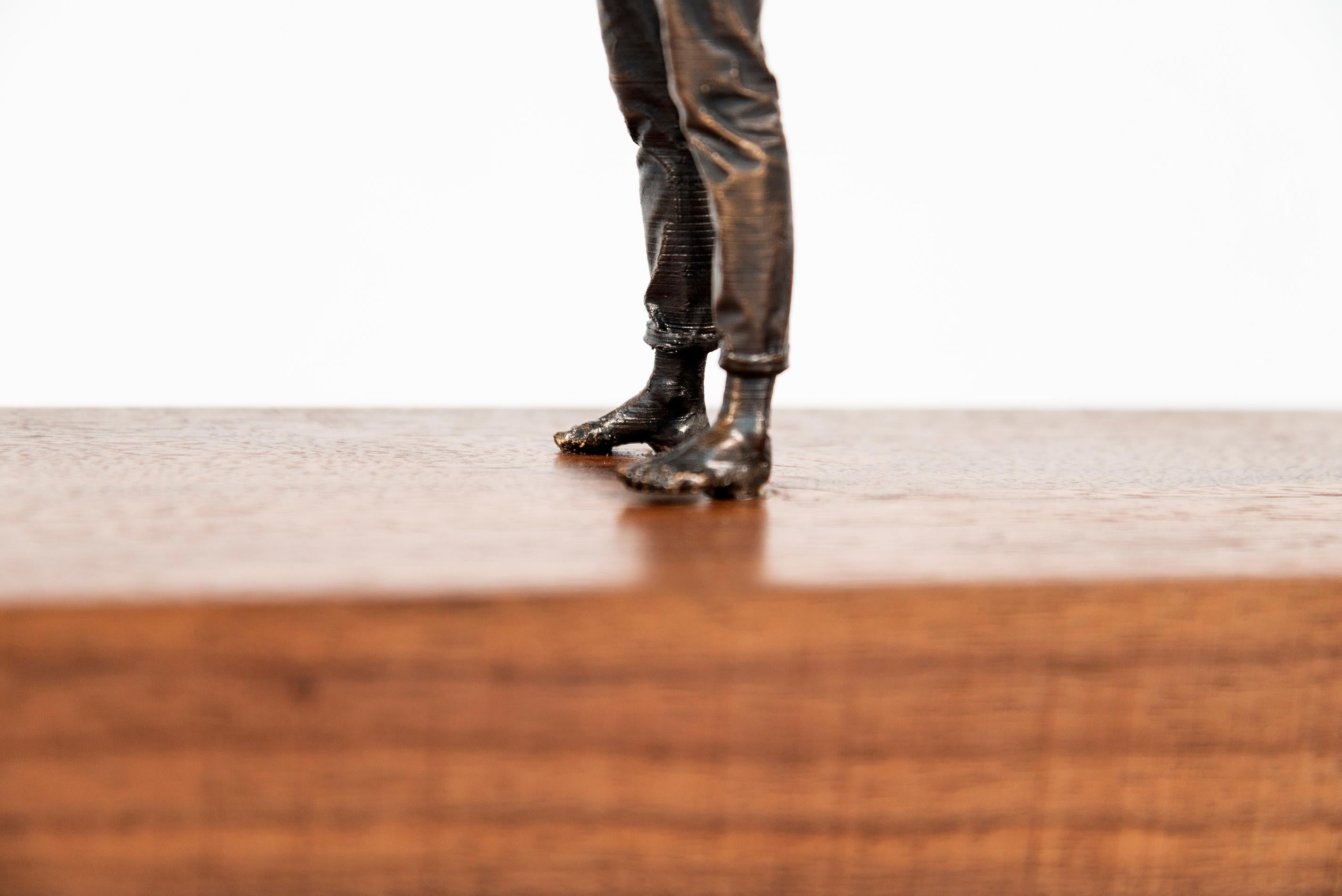 Wood 1/3 - petit, surréaliste, canoë, homme, figuratif, bois, bronze, sculpture - Marron Figurative Sculpture par Roch Smith