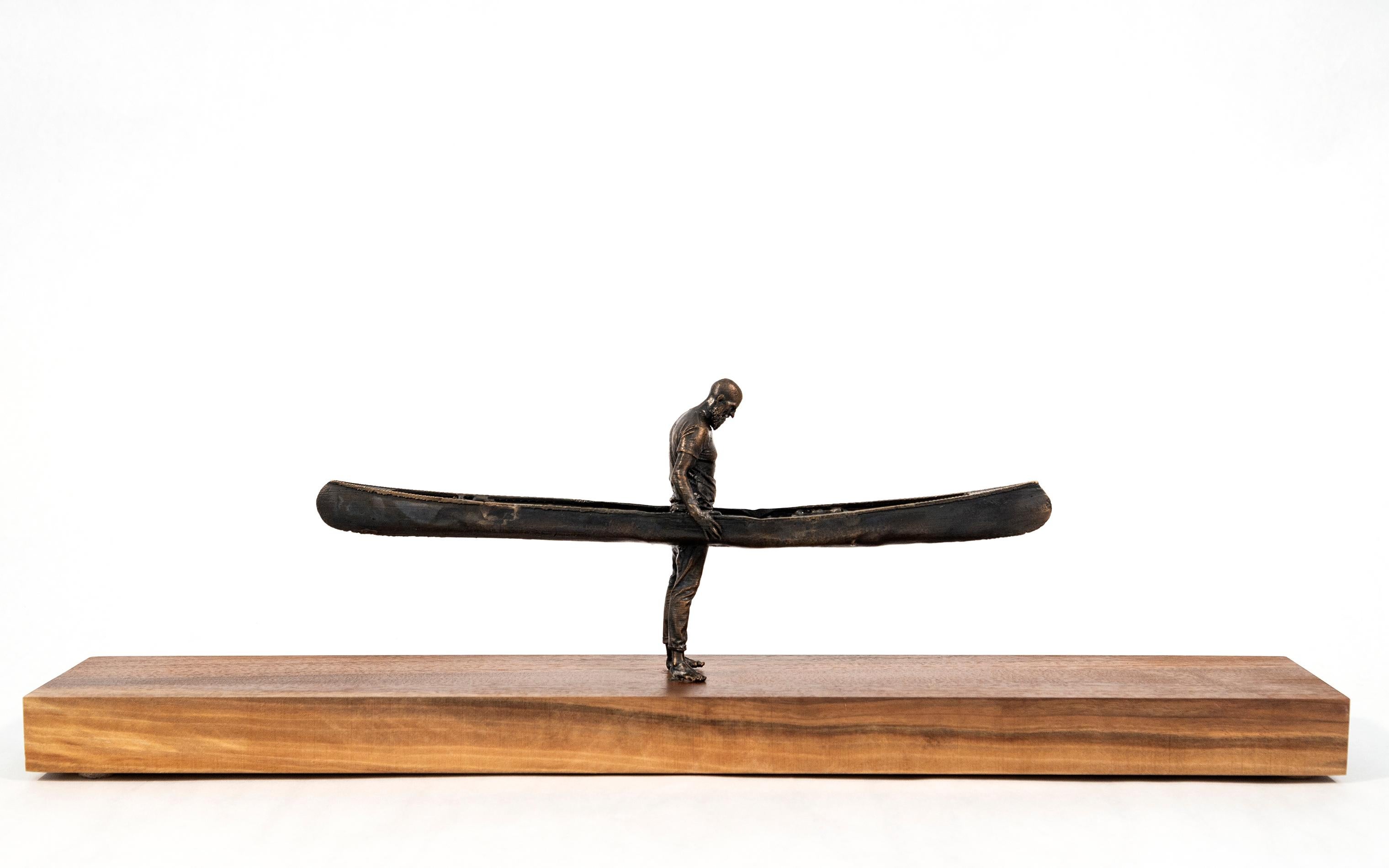 Figurative Sculpture Roch Smith - Wood 1/3 - petit, surréaliste, canoë, homme, figuratif, bois, bronze, sculpture