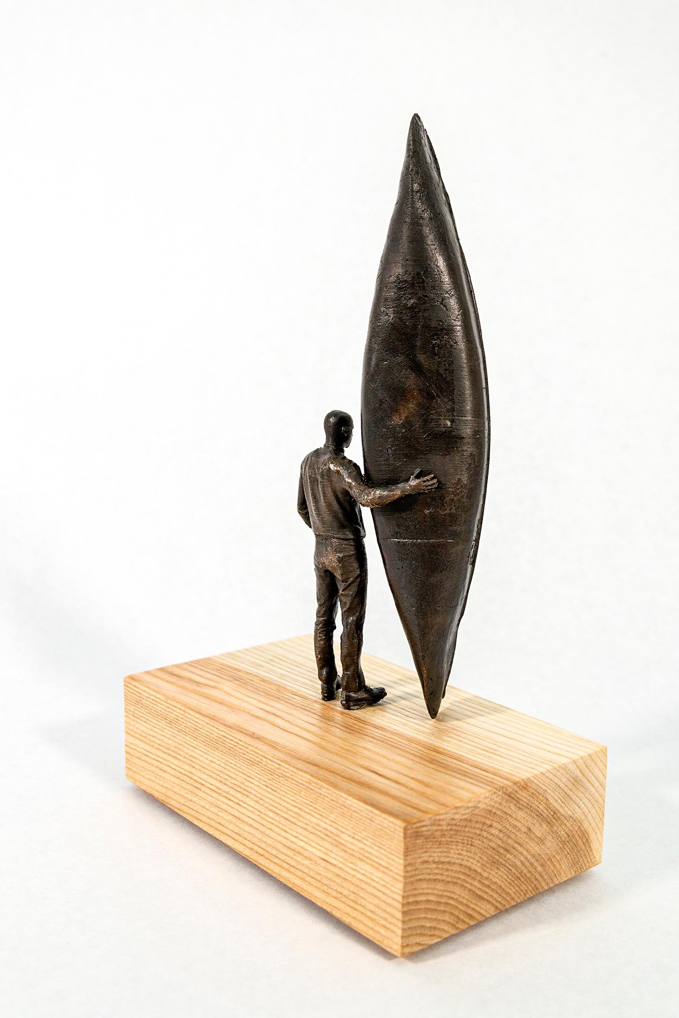 This bronze figurative tabletop sculpture by Roch Smith features a canoe.

Canadian sculptor Roch Smith has turned his attention to a cherished national and historic pastime—canoeing. Smith is highly regarded for his imaginative, hand forged,