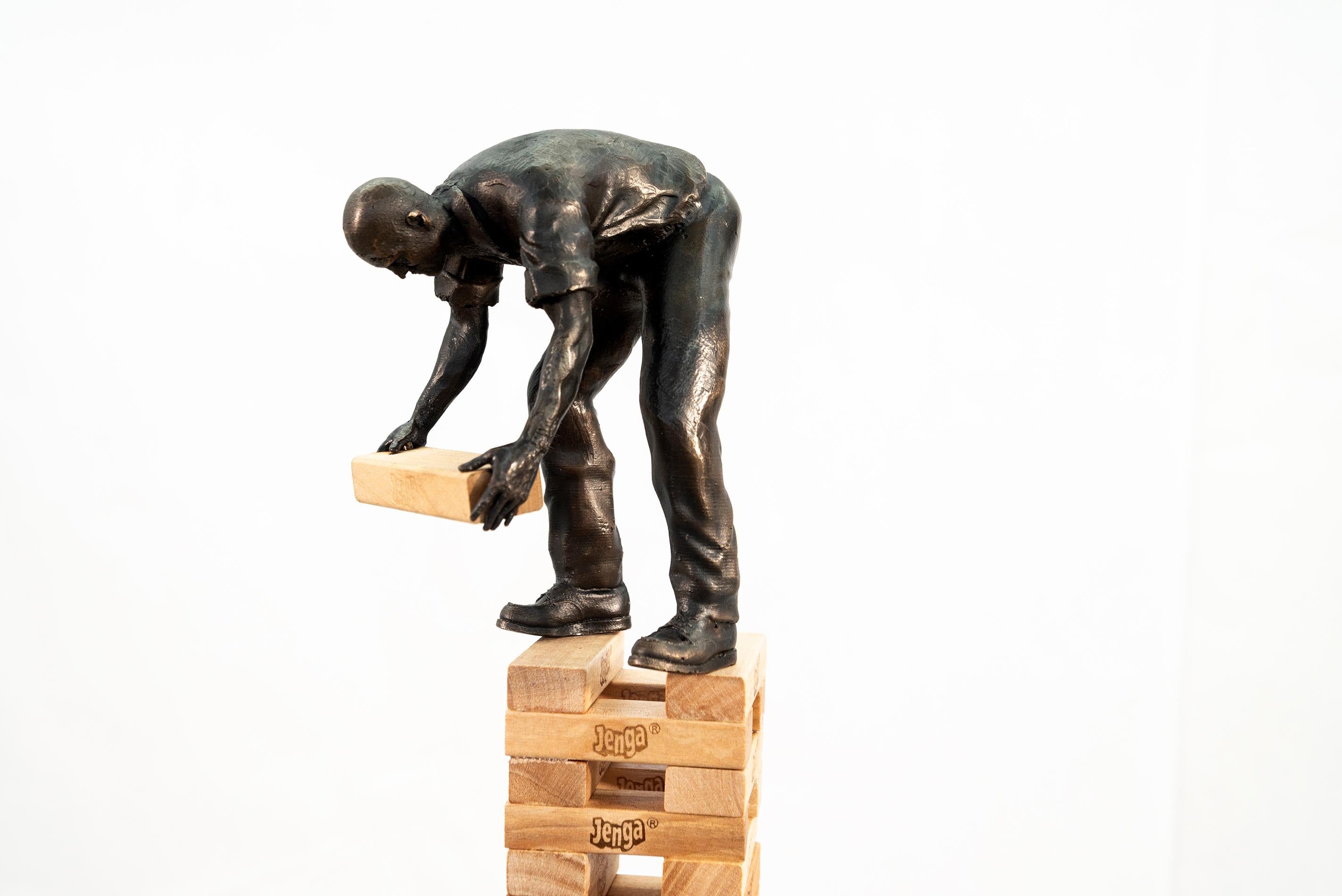 Roch Smith Figurative Sculpture - Work/Play Balance - tall, narrative, figurative, male, bronze, wood, sculpture