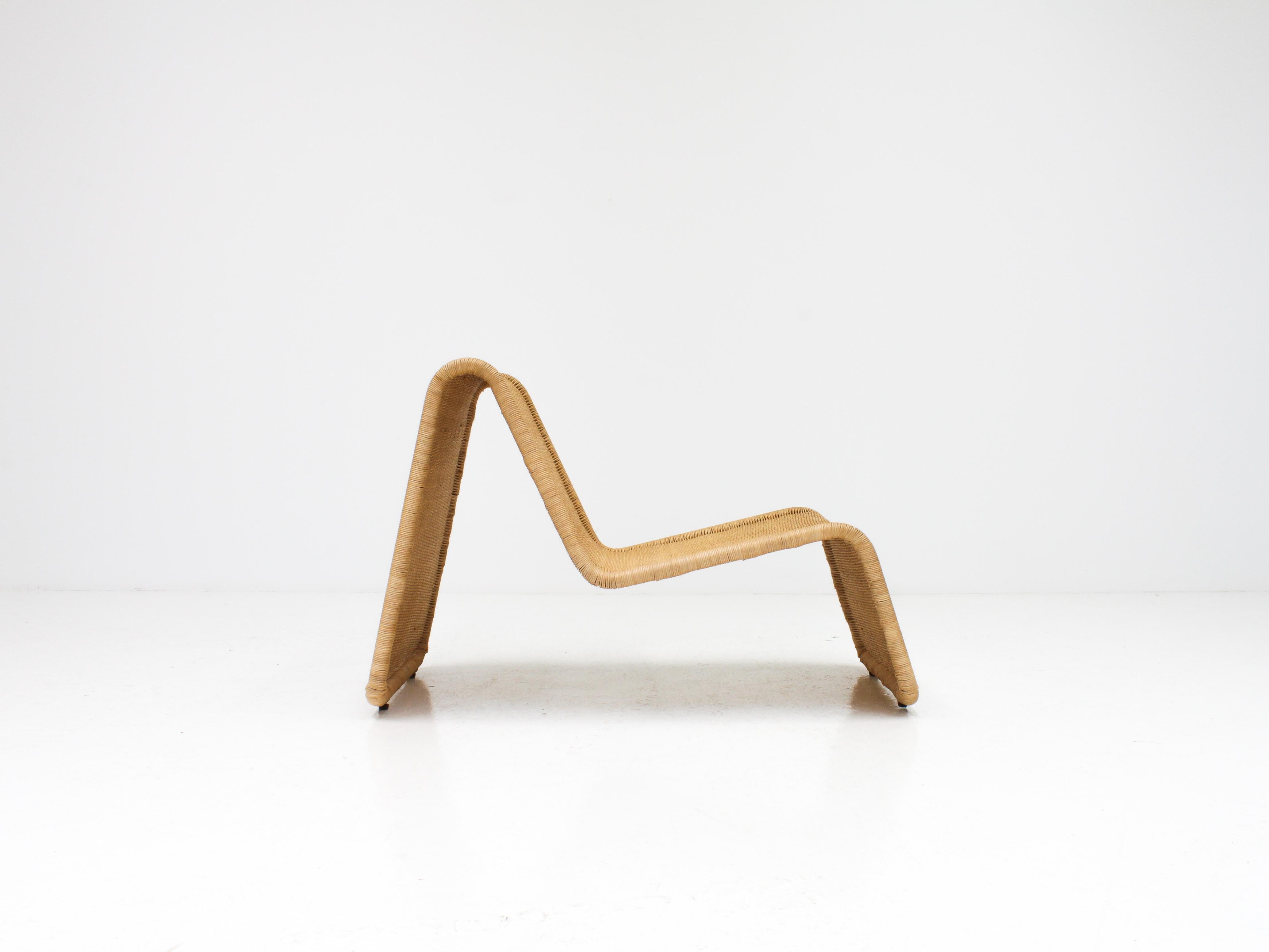 A great example model P3 easy chair designed by Tito Agnoli and manufactured by Pierantonio Bonacina, Italy, 1962. 

The chair has the original metal tubular frame which is covered in cane, in this case completely new cane. 

Wonderful ergonomic