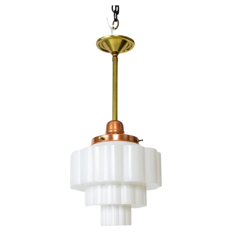 P309 Milk Glass and Copper Art Deco Skyscraper Pendant Light For Sale