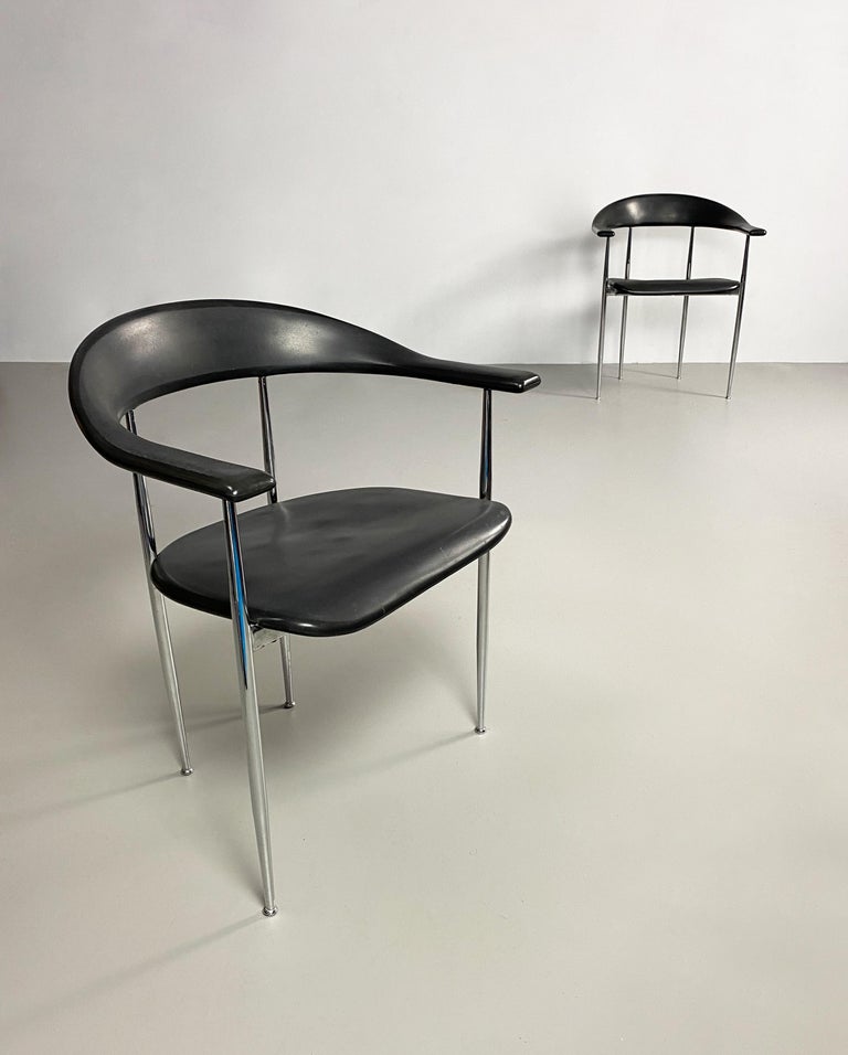 Black rubber and chrome plated steel 'P40' dining chair designed by Giancarlo Vegni & Gianfranco Gualtierotti for Fasem, Italy, c.1980.

Dimensions (cm, approx): 
Height: 74 
Width: 62 
Depth: 52.