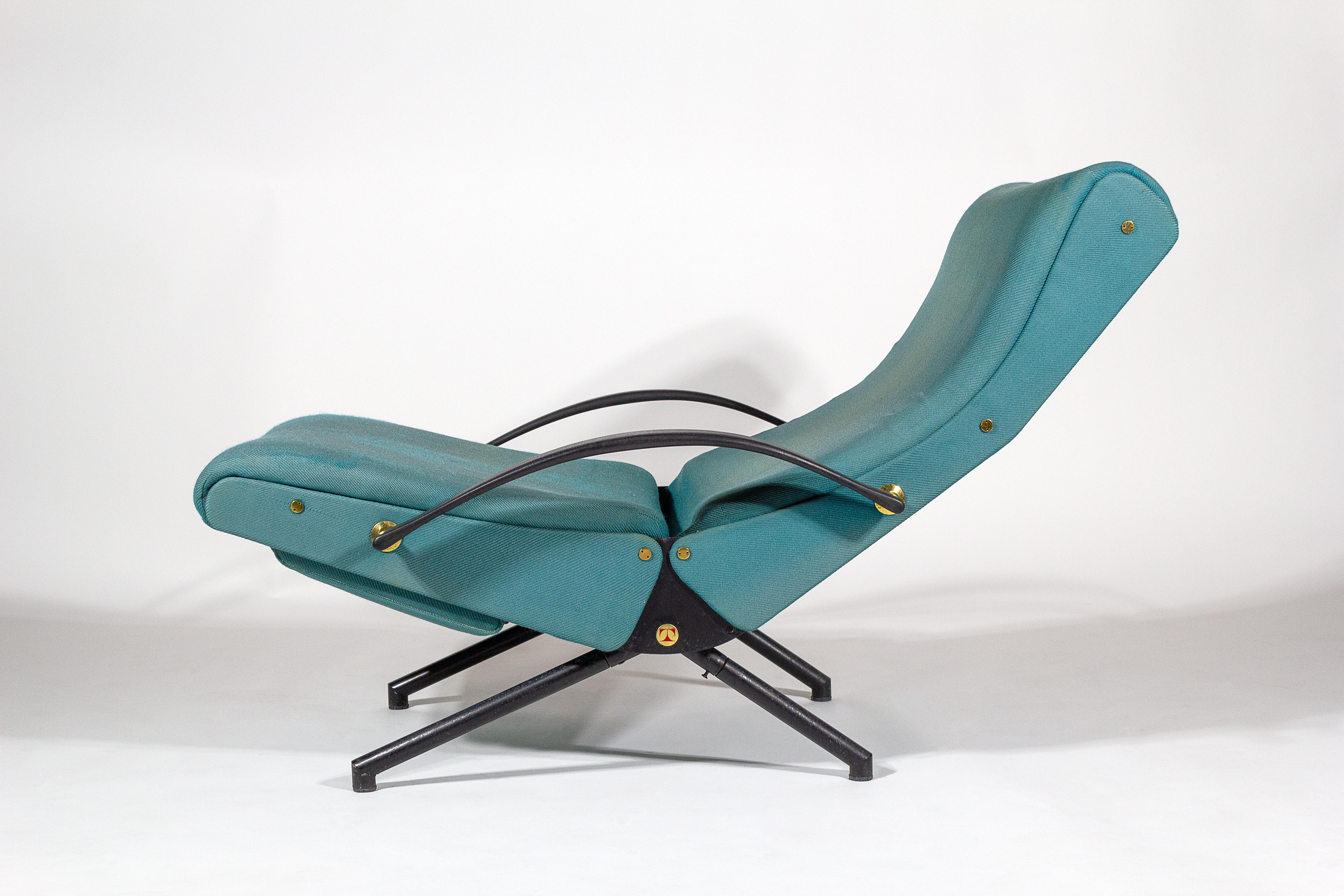 Early production P40 lounge chair designed by Osvaldo Borsani for Tecno, Italy, 1950s. The lounge, with an extendable footrest, is designed to recline and can be set in several positions. 

Osvaldo Borsani, an Italian architect and furniture
