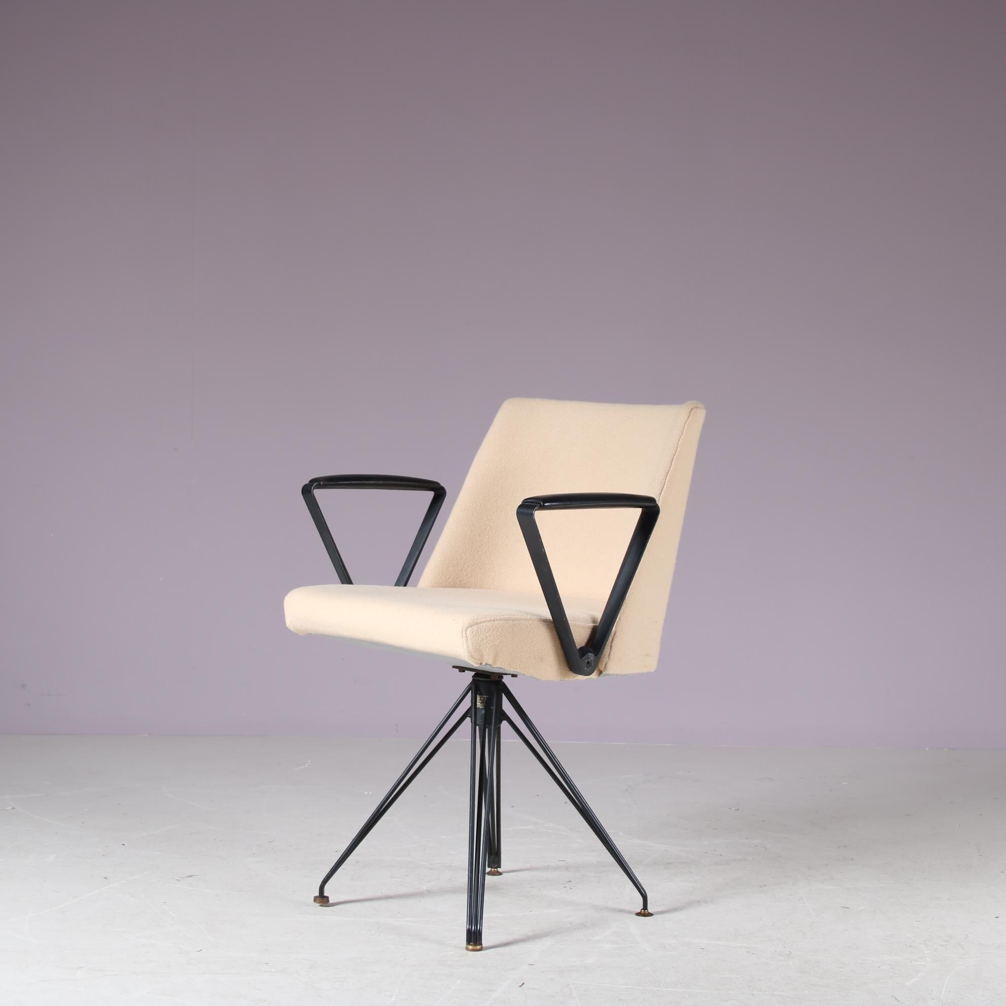 A very rare “P99” desk chair designed by Osvaldo Borsani and manufactured by Tecno in Italy around 1950.

A remarkable chair, made of high quality black lacquered metal with cream / light beige fabric upholstery. A triangle structure and armrests in