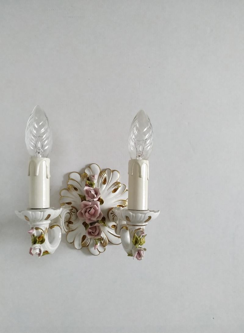 Pair of lovely vintage porcelain sconces.
Italy, 1970s.