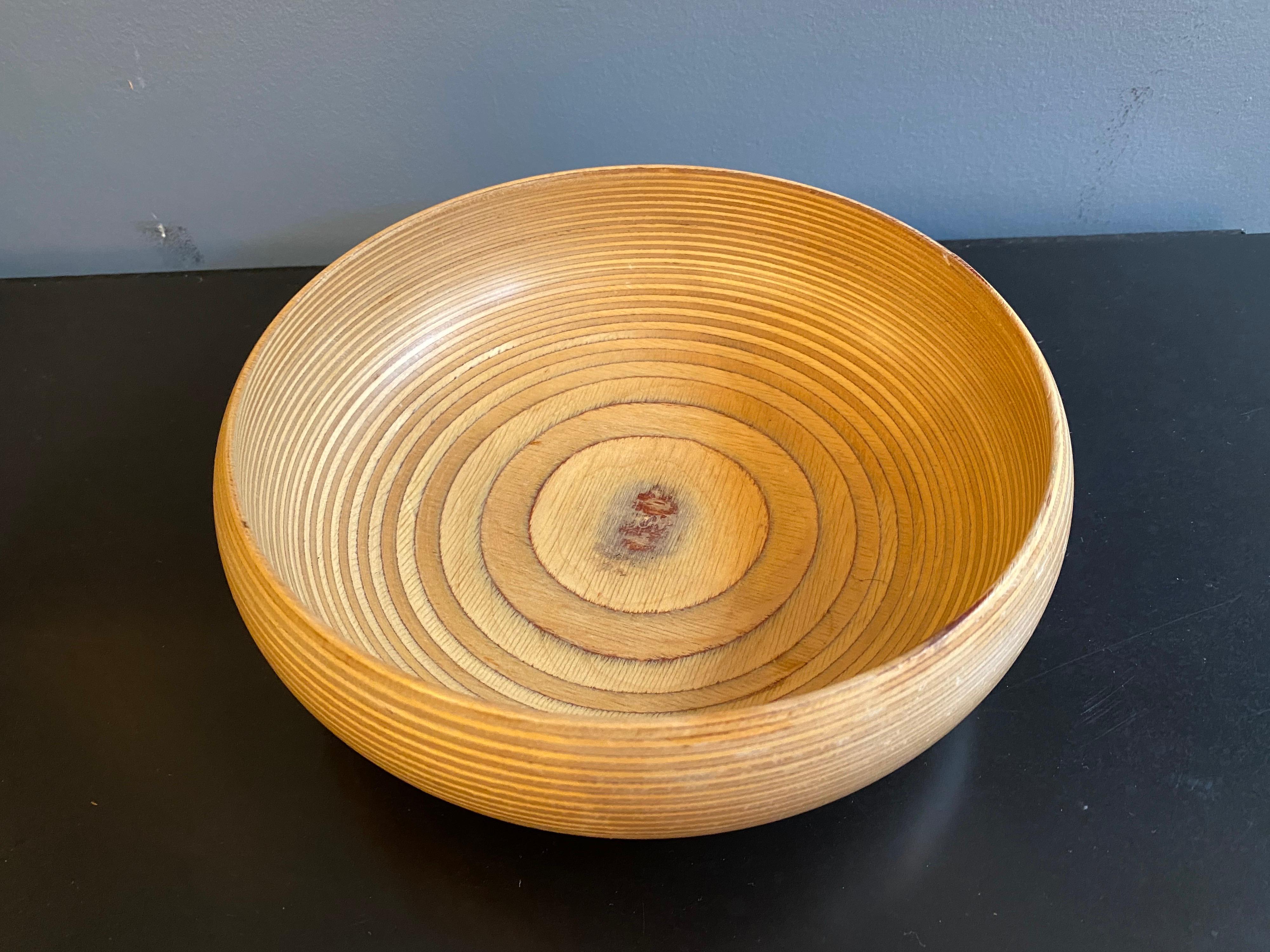 Paavo Asikainen turned laminated wood bowl, marked on bottom. Nice size and color.