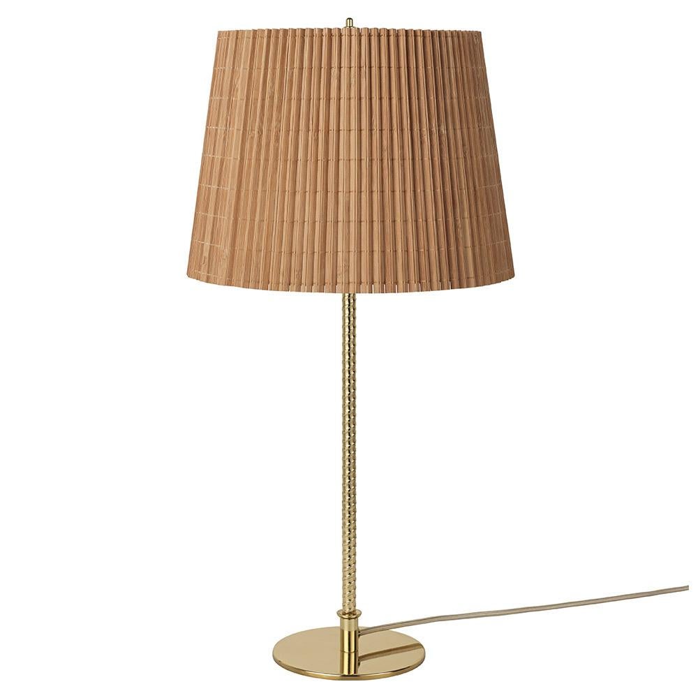 First produced around 1950, the 9205 is a classic, almost archetypal, table lamp with an unmistakable Tynell aesthetic. Elegant and slender, the lamp’s apparently simple form conceals an extraordinary degree of craftsmanship and highly skilled