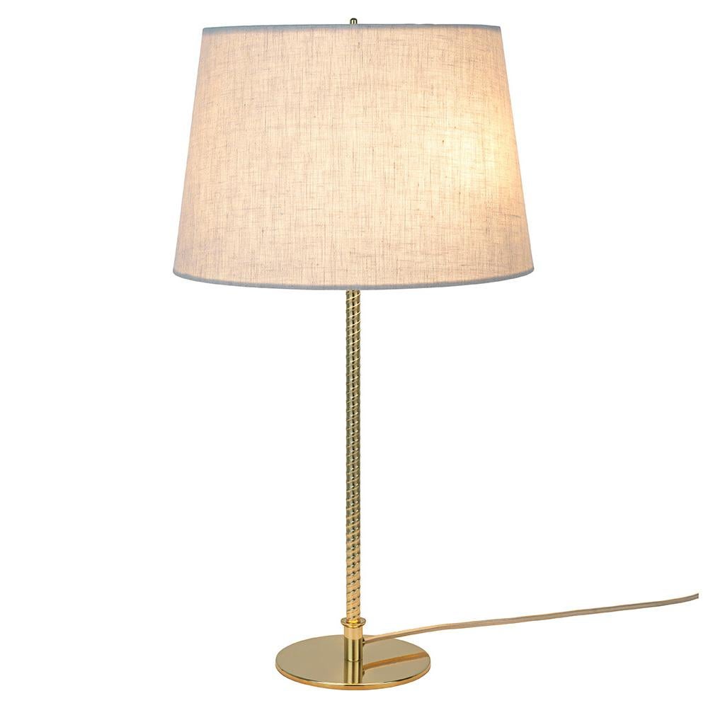 First produced around 1950, the 9205 is a classic, almost archetypal, table lamp with an unmistakable Tynell aesthetic. Elegant and slender, the lamp’s apparently simple form conceals an extraordinary degree of craftsmanship and highly skilled