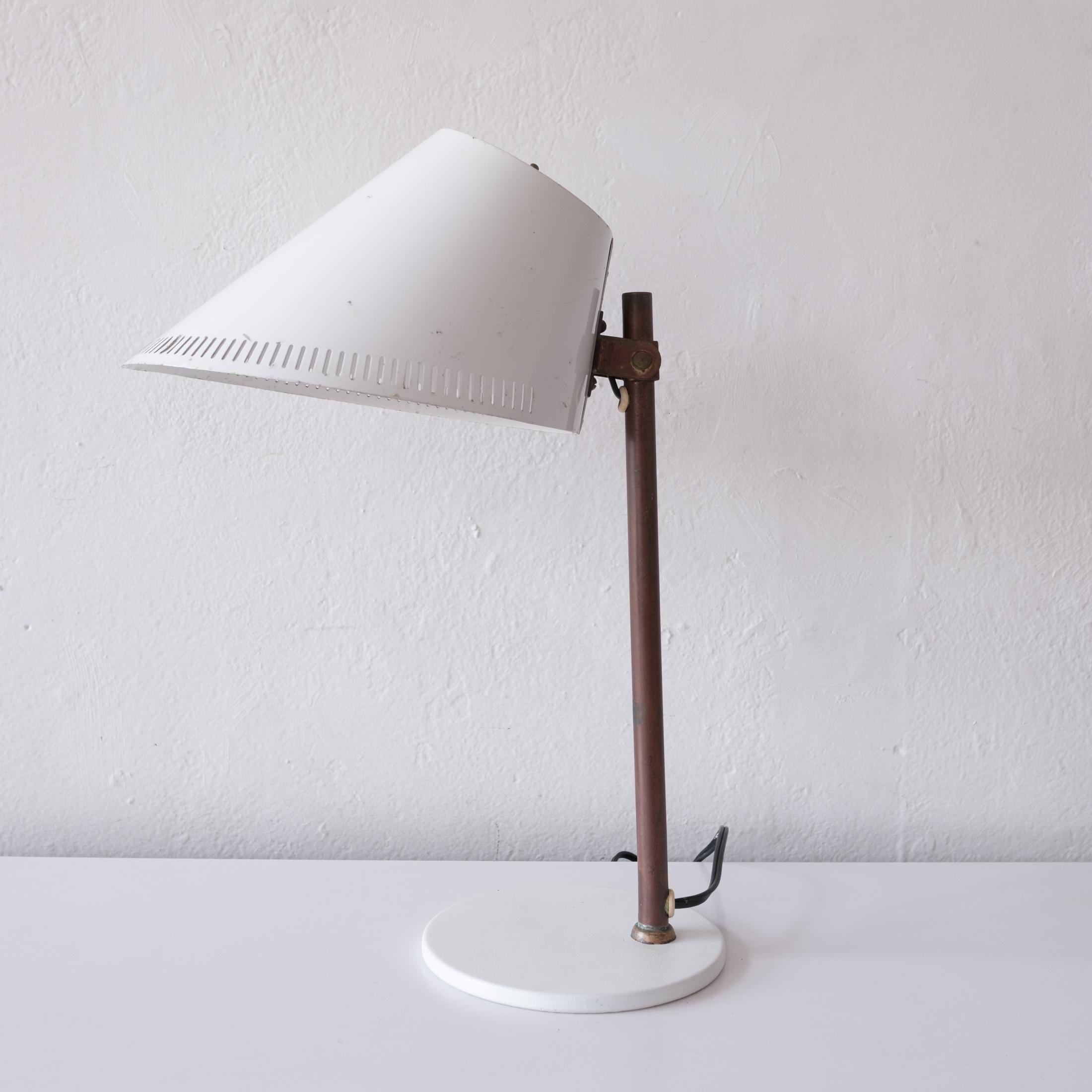 Paavo Tynell 9227 table or desk lamp. A great vintage example with a beautiful patina to the brass. Made in Finland, 1955. 

Impressed manufacturer's mark to brass stem, Idman. Cast manufacturer's mark to underside Taito 9227 Idman VM 424