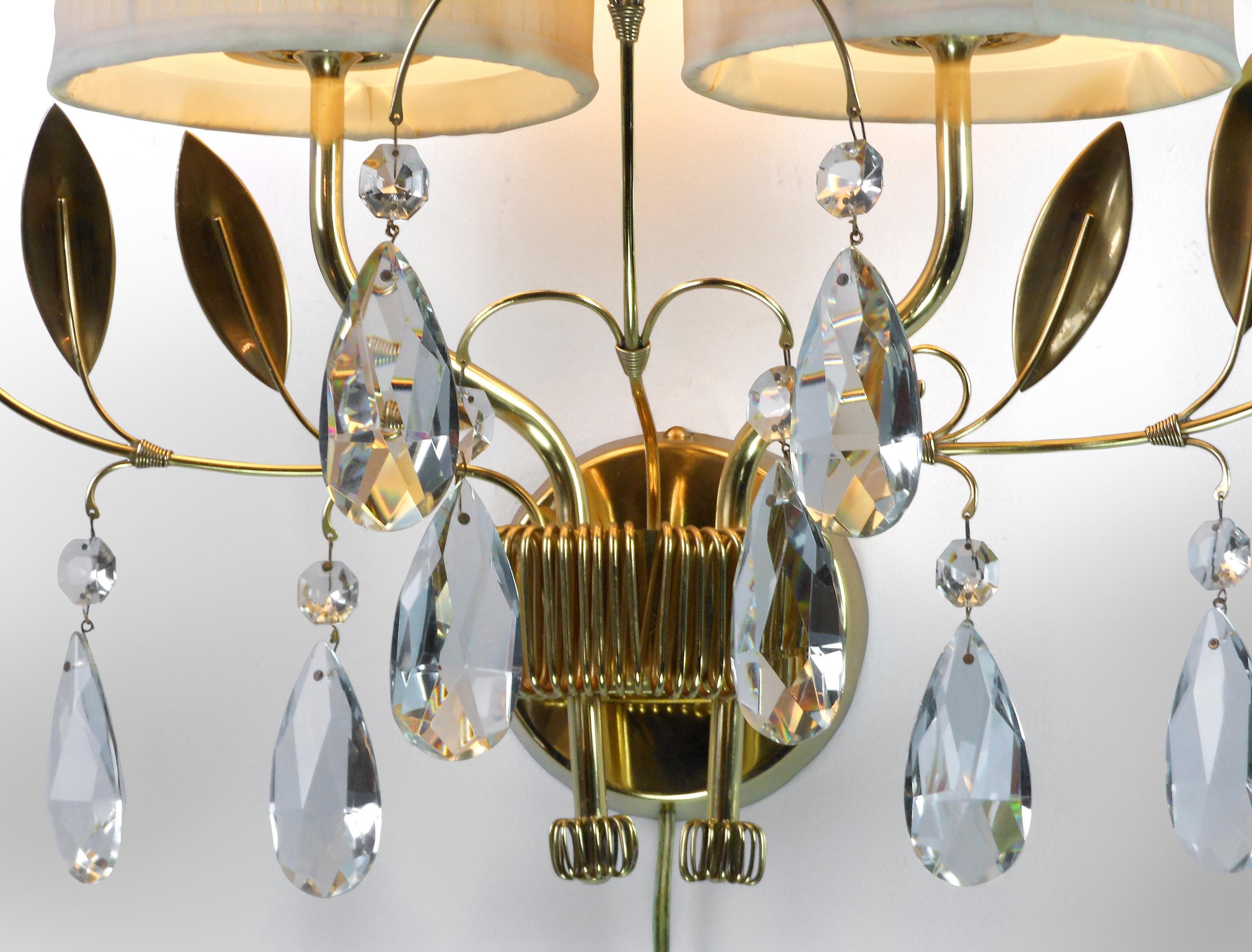 Scandinavian Modern Paavo Tynell, a Single Finnish Crystal and Brass Sconces For Sale