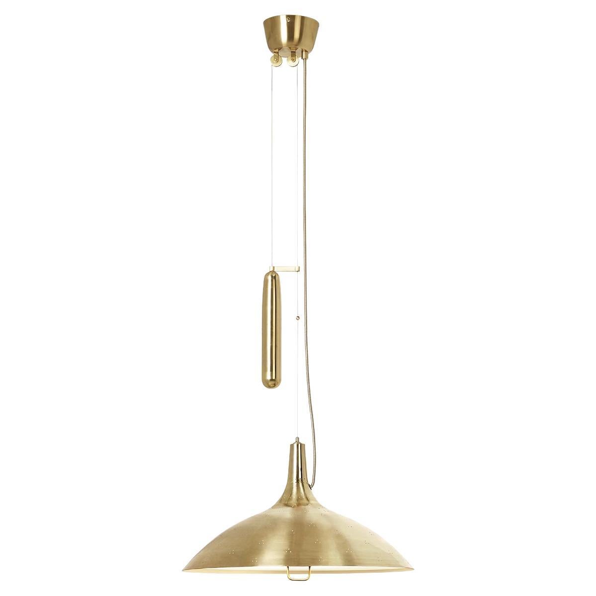 Unveiled in 1947 at the Finland House in New York, the A1965 Pendant was an instant success for Paavo Tynell and one of the lighting fixtures considered to define his mid-century peak. It delicately holds some of his most distinctive design traits;