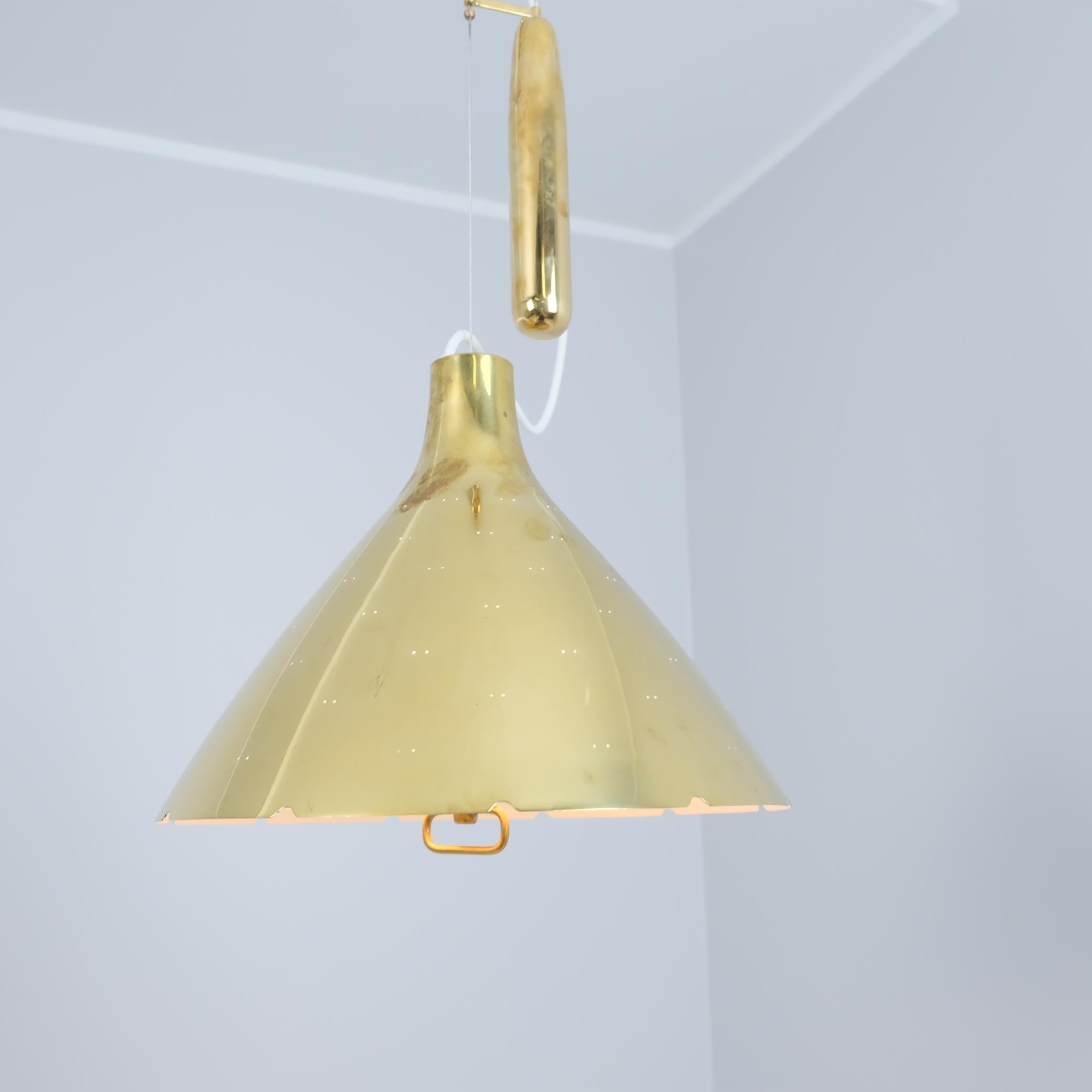 Scandinavian Modern Paavo Tynell Adjustable Ceiling Lamp A1982MS, Full Perforated Brass, Idman 1950s For Sale