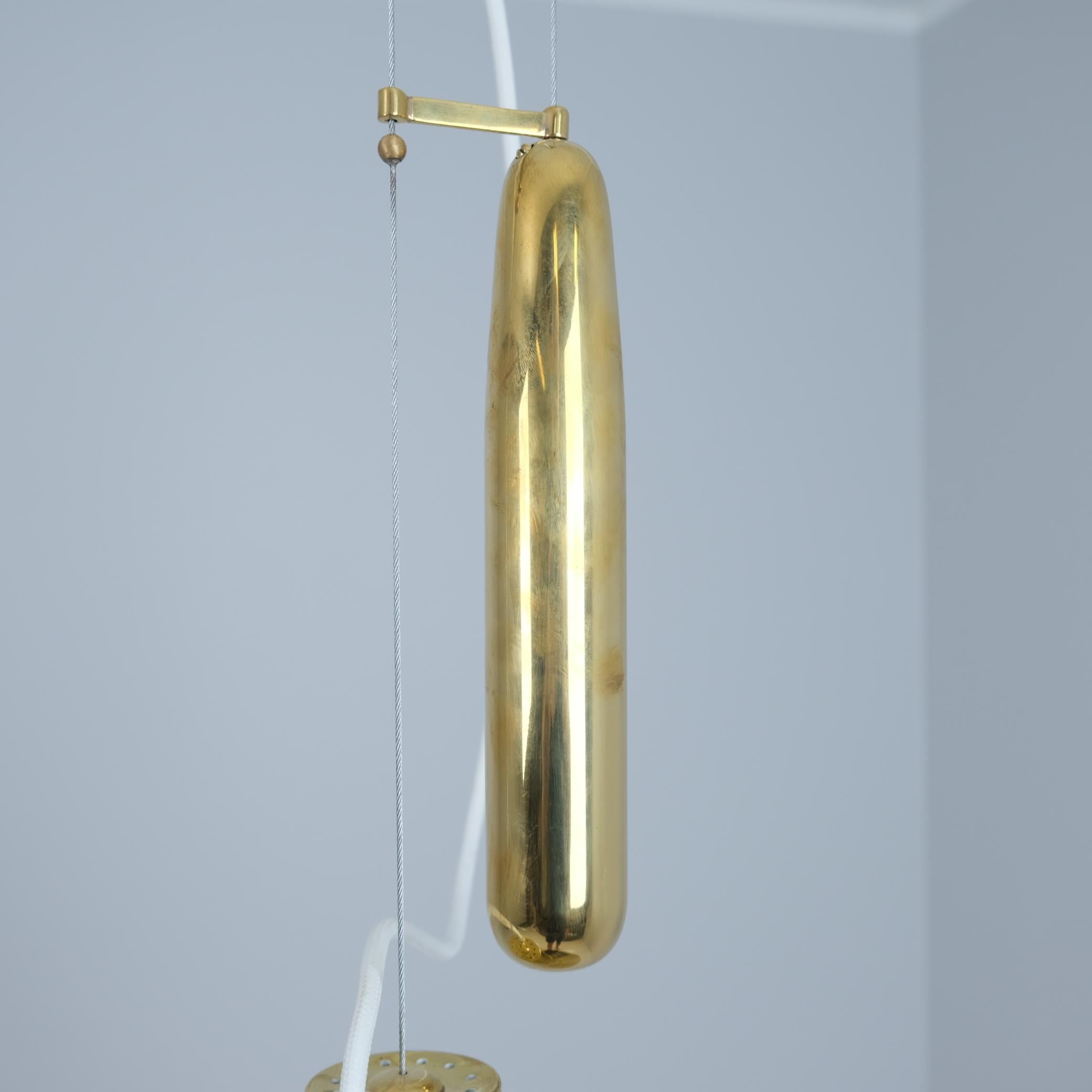 Mid-20th Century Paavo Tynell Adjustable Ceiling Lamp A1982MS, Full Perforated Brass, Idman 1950s For Sale