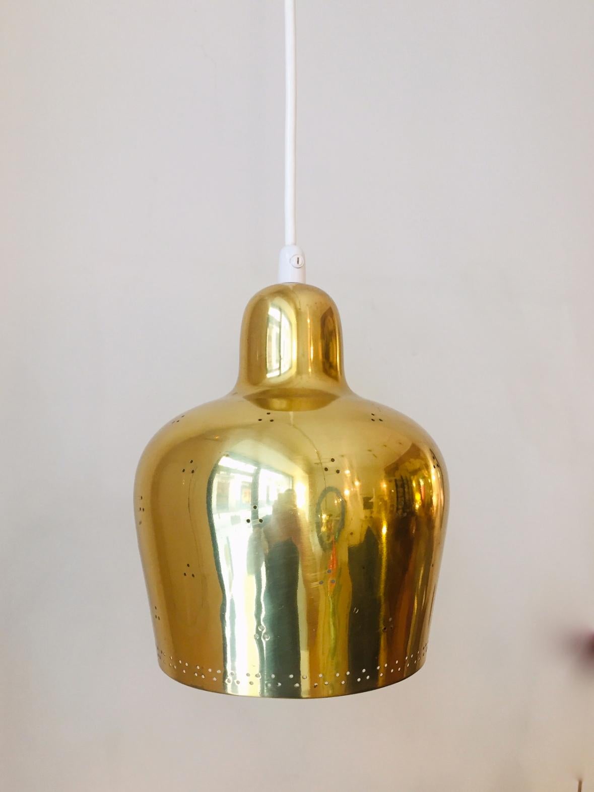 Mid-20th Century Paavo Tynell and Alvar Aalto Perforated Brass Pendant Light for Taito Oy