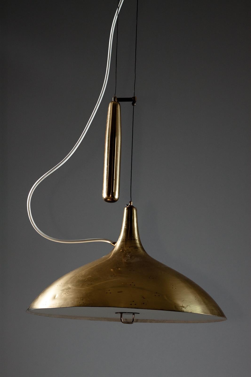 20th Century Paavo Tynell, brass counterweight light A1965 for TAITO Oy For Sale