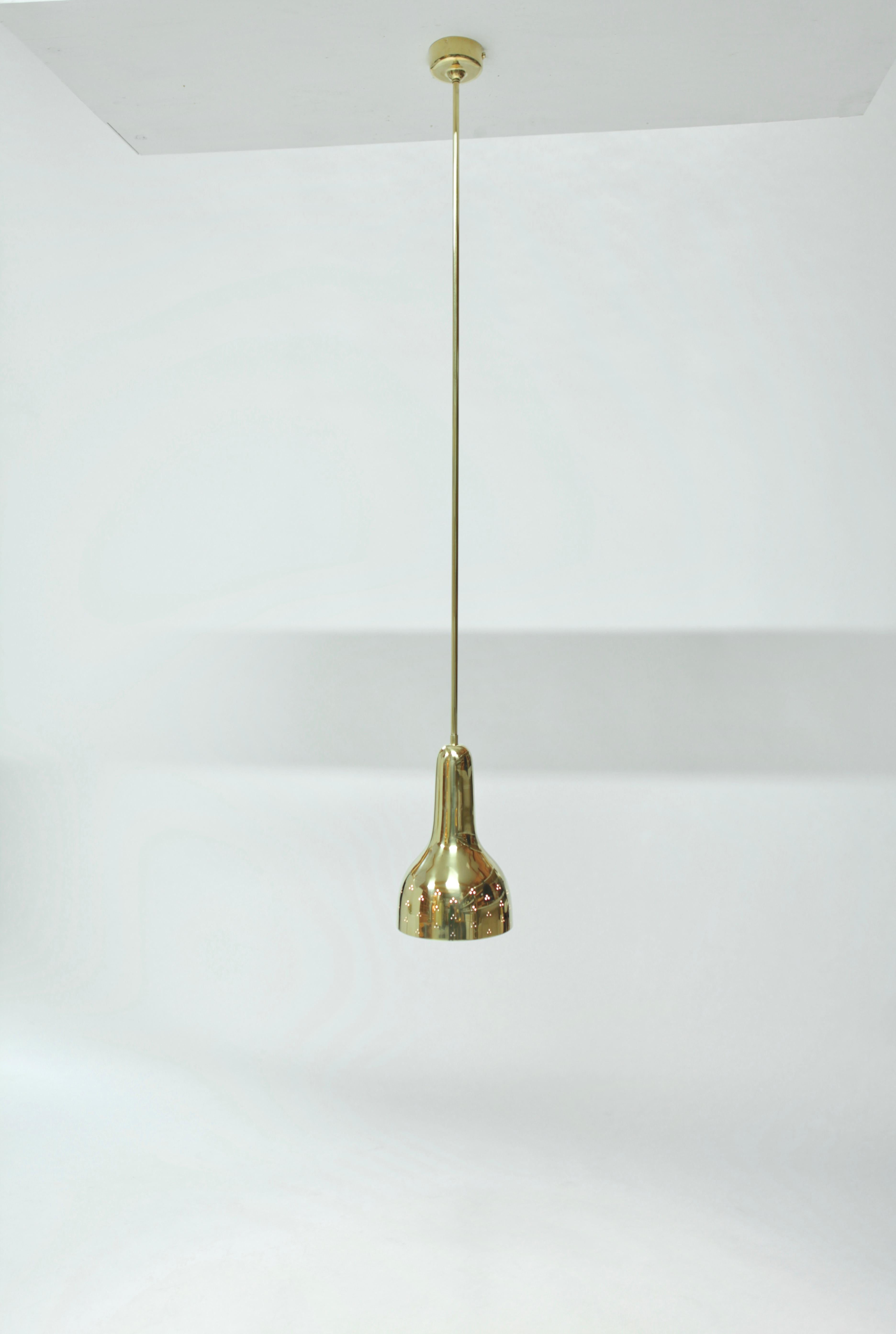 A rare ceiling light designed by Paavo Tynell & manufactured by Taito Oy in Finland 1946.
This lamp is originally designed for the restaurant 'Kestikartano' in Helsinki, 1946.
Perforated brass, all parts original.
Beautiful condition.