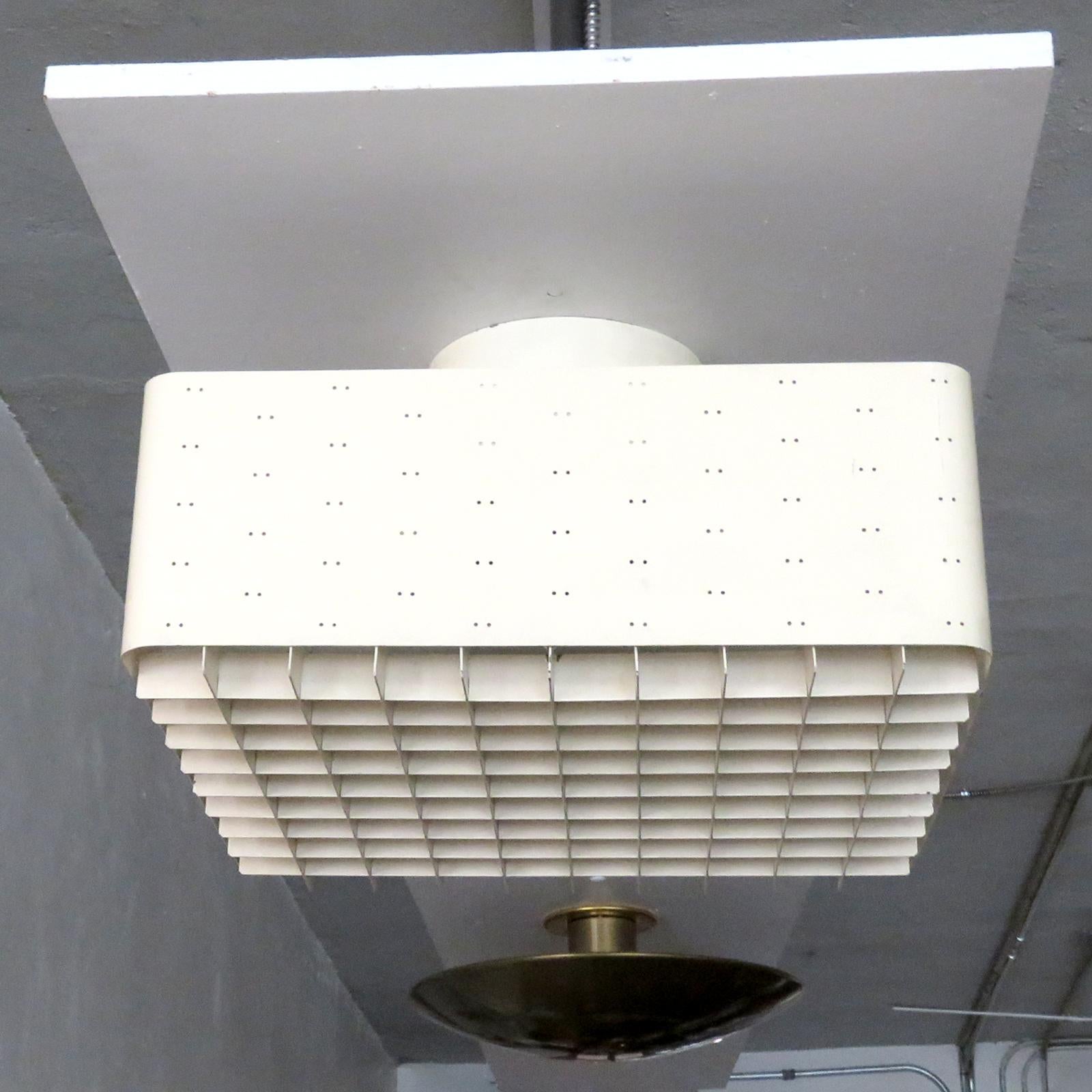 Stunning flush mount ceiling light, 'Starry Sky', Model 9068, by Paavo Tynell for Idman, Helsinki, Finland, circa 1955, in enameled, perforated metal with frosted glass diffuser, stamped with manufacturer's label, can be used as a flush mount or