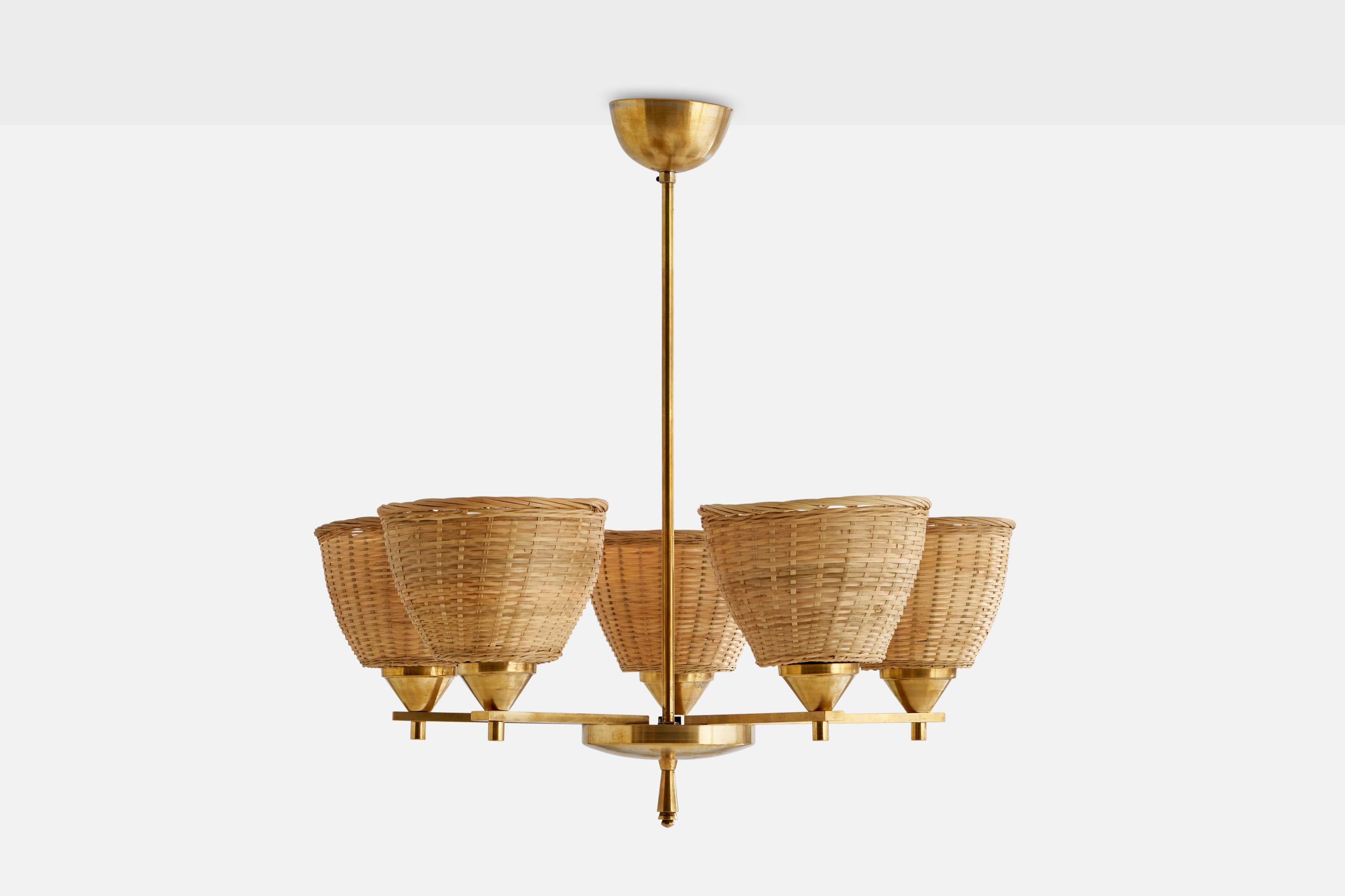 A five-armed brass and rattan chandelier, model 1356, designed by Paavo Tynell and produced by Taito Oy, Finland, 1930s.

Dimensions of canopy (inches): 2.3” H x 3.98” Diameter
Socket takes standard E-26 bulbs. 2 sockets.There is no maximum wattage