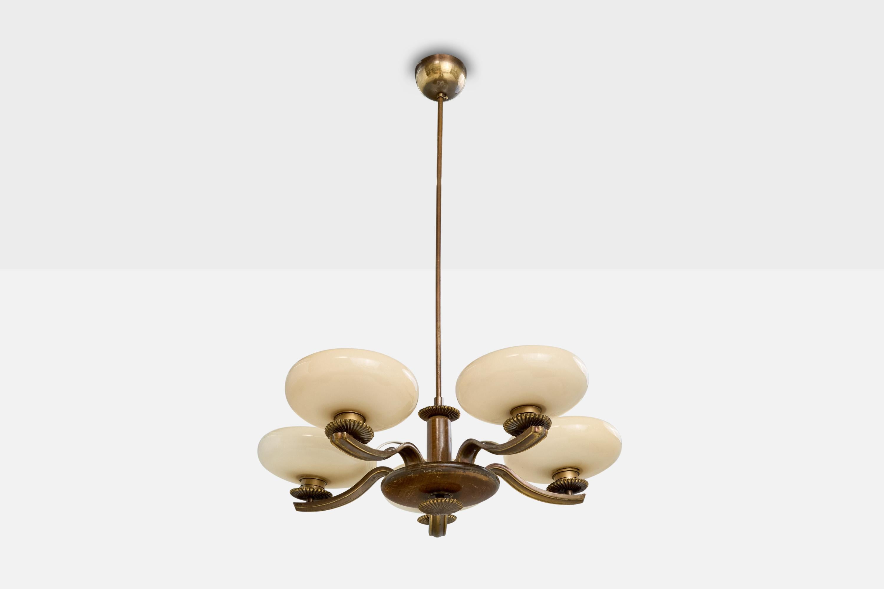 A dark-stained wood, brass and cream-white glass chandelier designed by Paavo Tynell and produced by Taito, OY, Finland, 1930s.

Overall Dimensions (inches): 37.5” H x 24.5” Diameter

Dimensions of Canopy: 2.5“ H x 4” Diameter 

Stem length: 29”