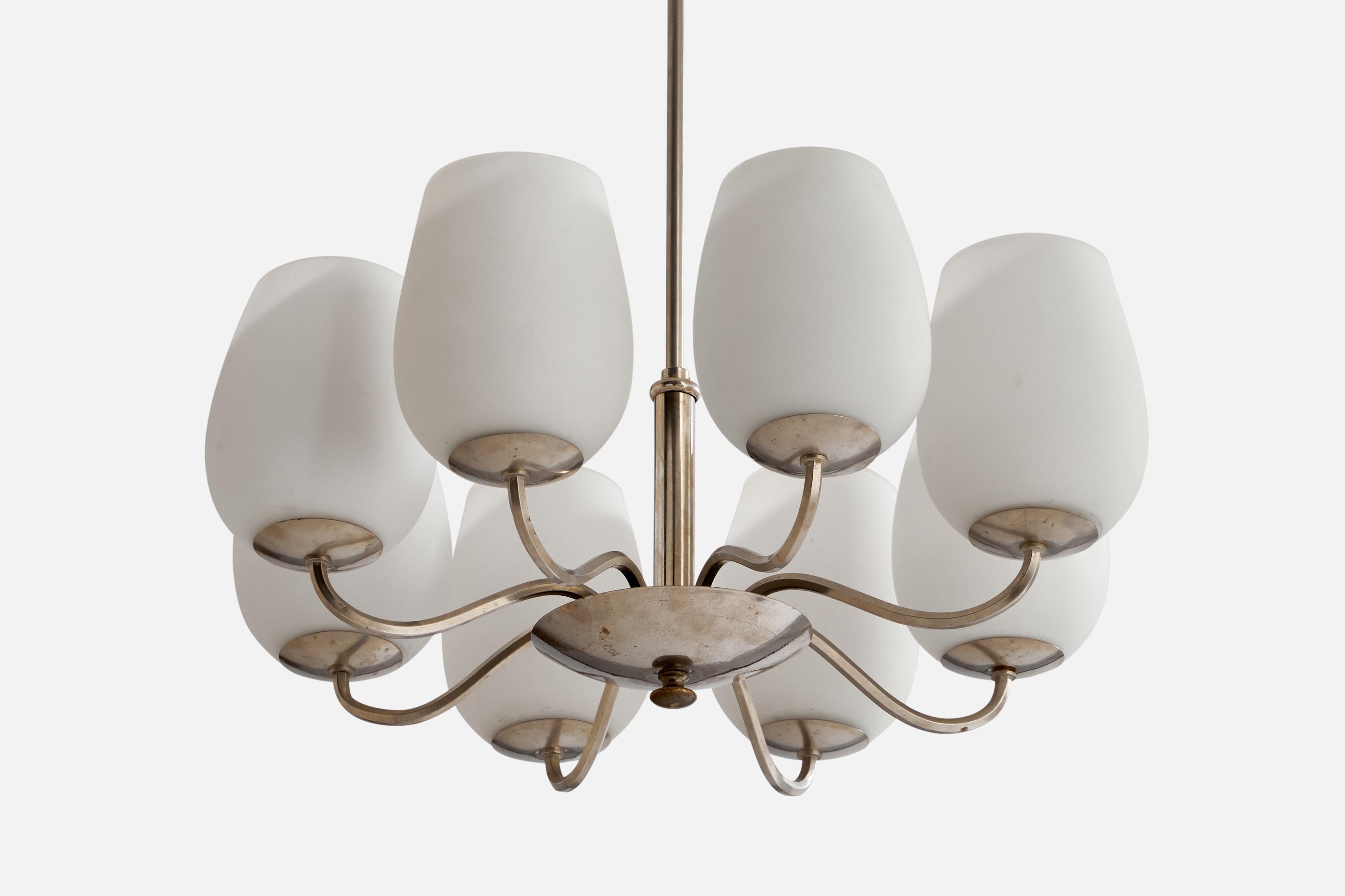 A nickel-plated brass and opaline glass chandelier, model 5057/8, designed by Paavo Tynell and produced by Taito Oy, Finland, 1940s.

Dimensions of canopy (inches): 2.1” H x 3.55” Diameter
Socket takes standard E-26 bulbs. 8 sockets.There is no