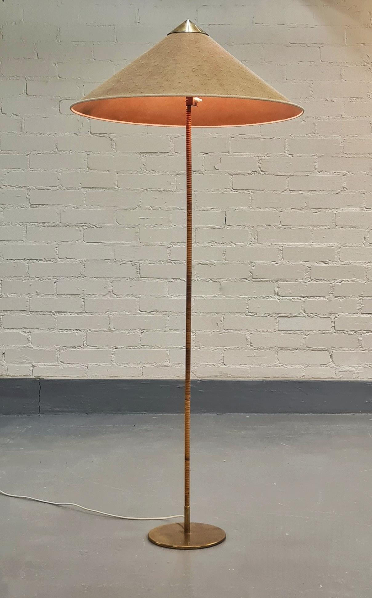This iconic floor lamp was originally designed by Paavo Tynell in the late 1930s and has been refined during the golden era of the Tynell design in the second half of the 1940s. This exquisite lamp still retains all of the original parts including
