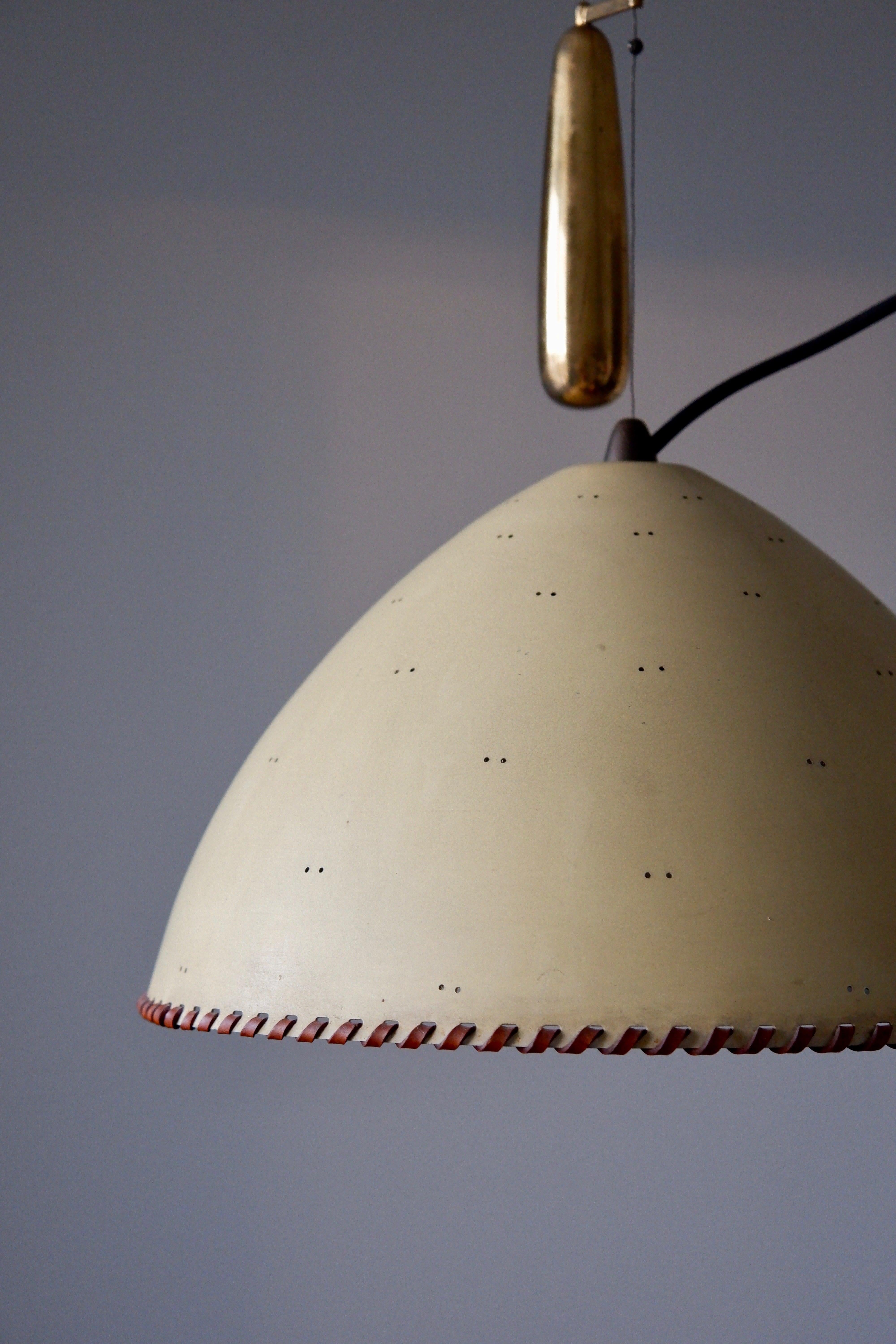 Finnish Paavo Tynell counter weight pendant light model a 1983, Taito OY, circa 1940