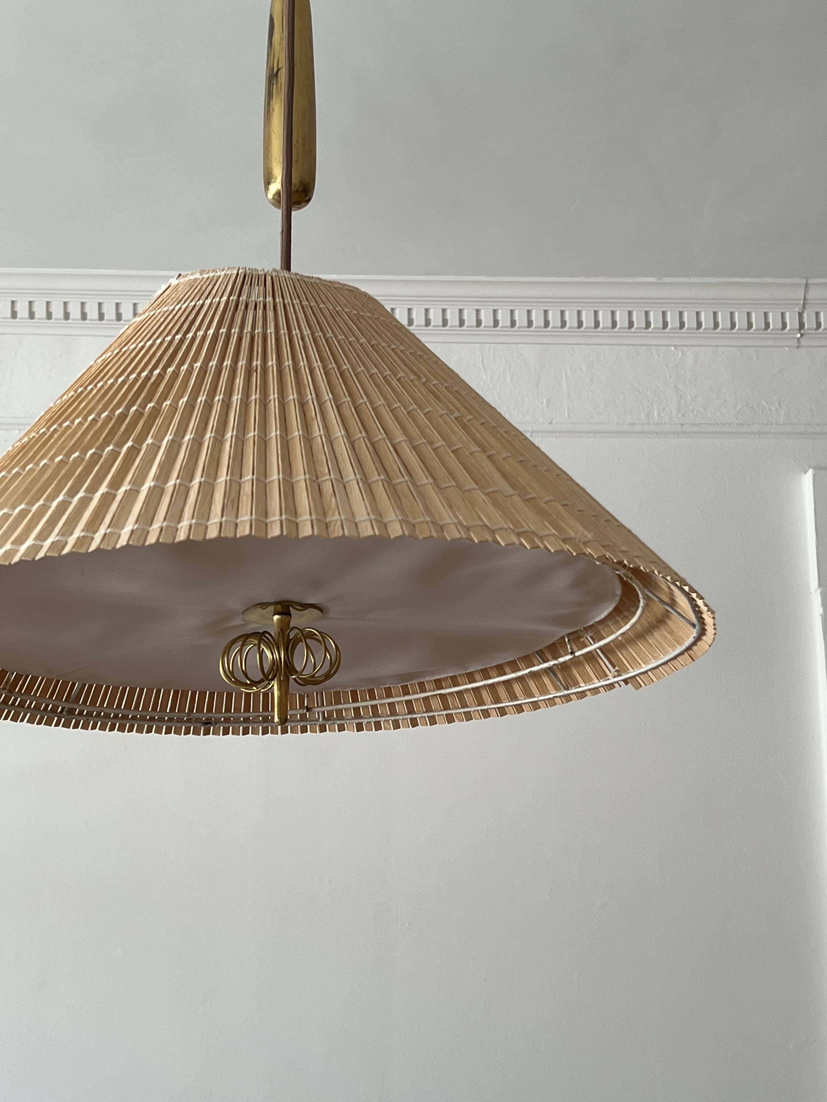 Mid-Century Modern Paavo Tynell, Counter-Weight Pendant, Brass, Paper, Reed, Taito, Finland, 1940s