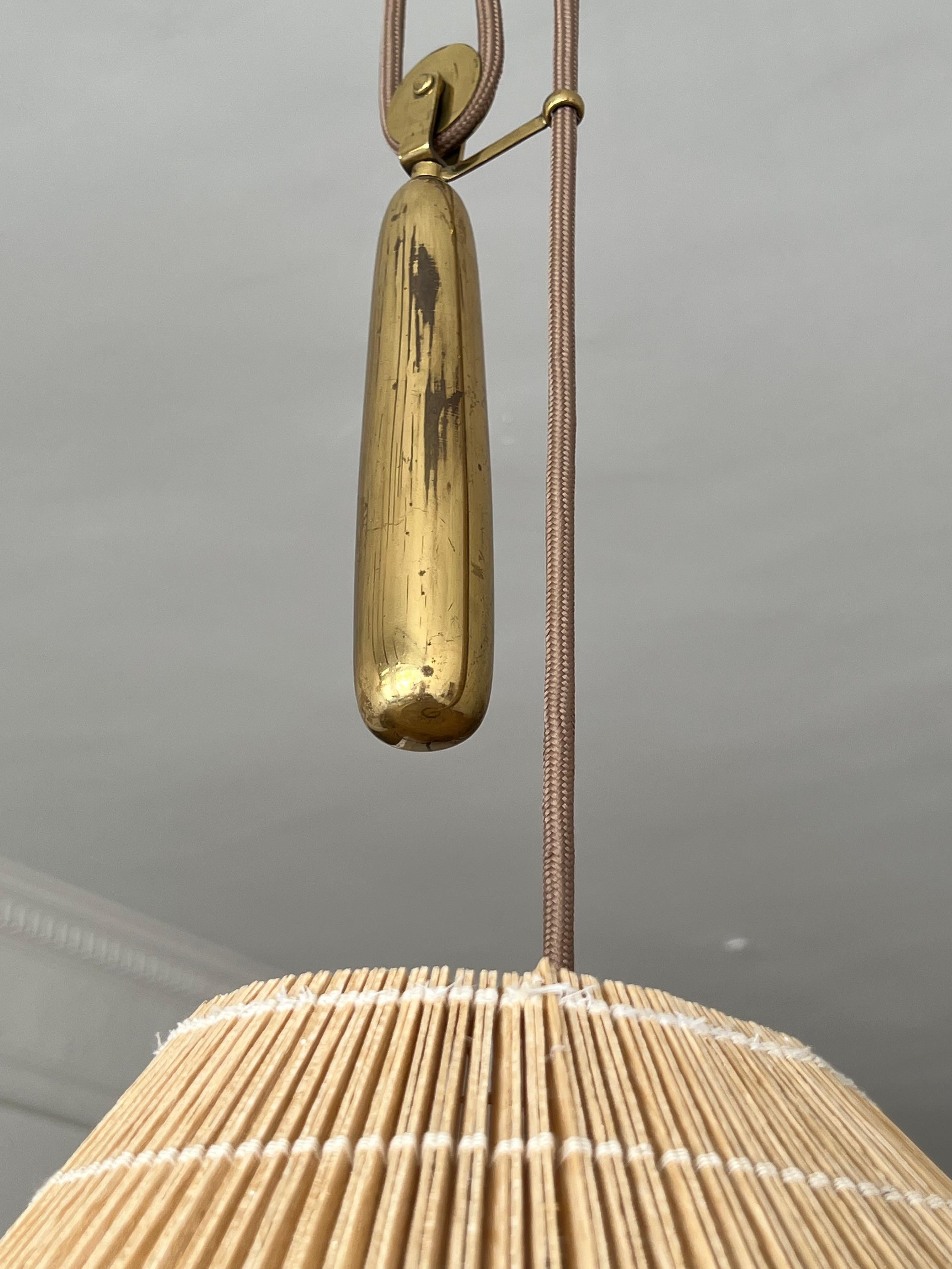 Paavo Tynell, Counter-Weight Pendant, Brass, Paper, Reed, Taito, Finland, 1940s In Good Condition In High Point, NC