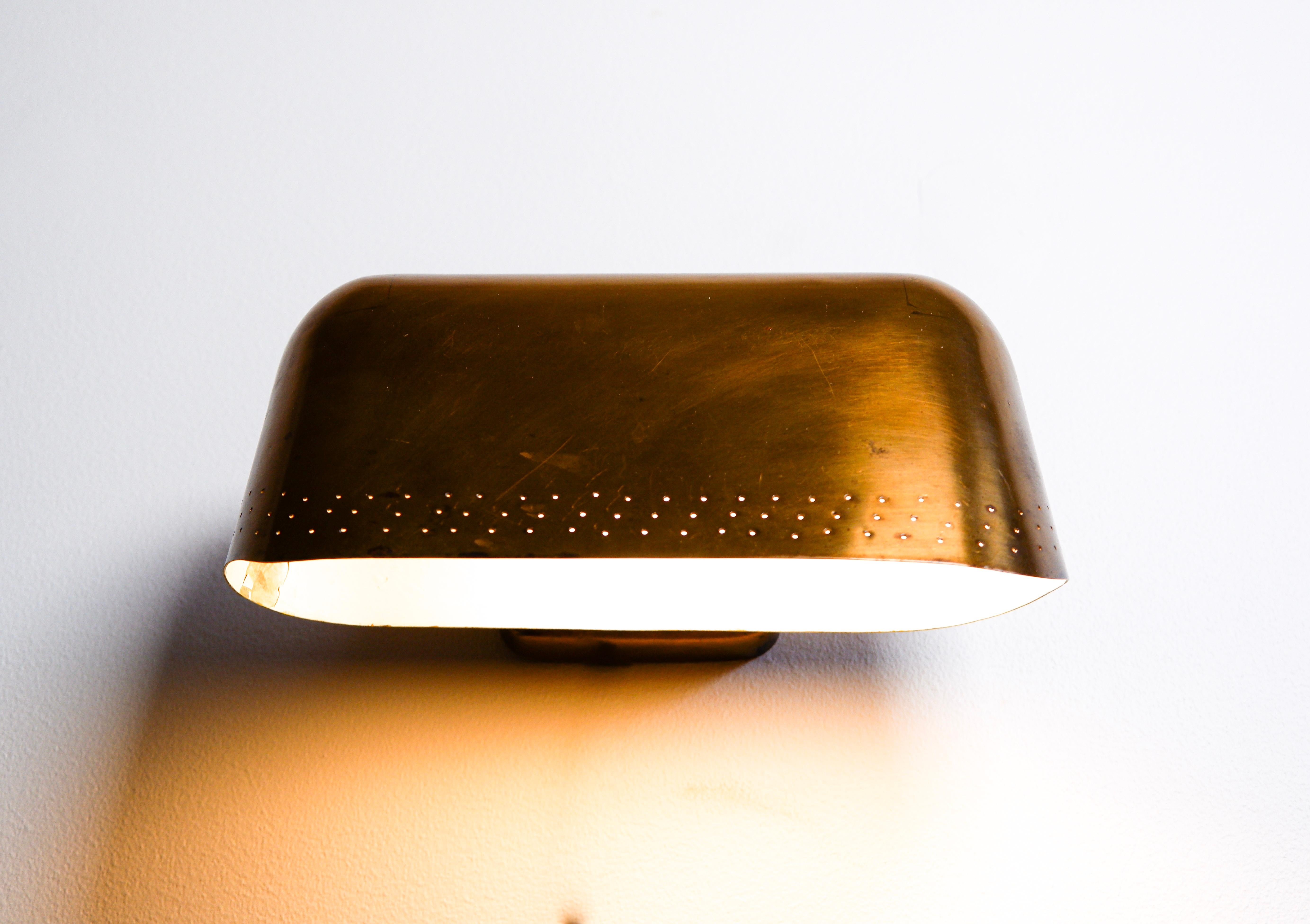 Brass Paavo Tynell custom wall lamp. circa 1950. Taito Oy For Sale