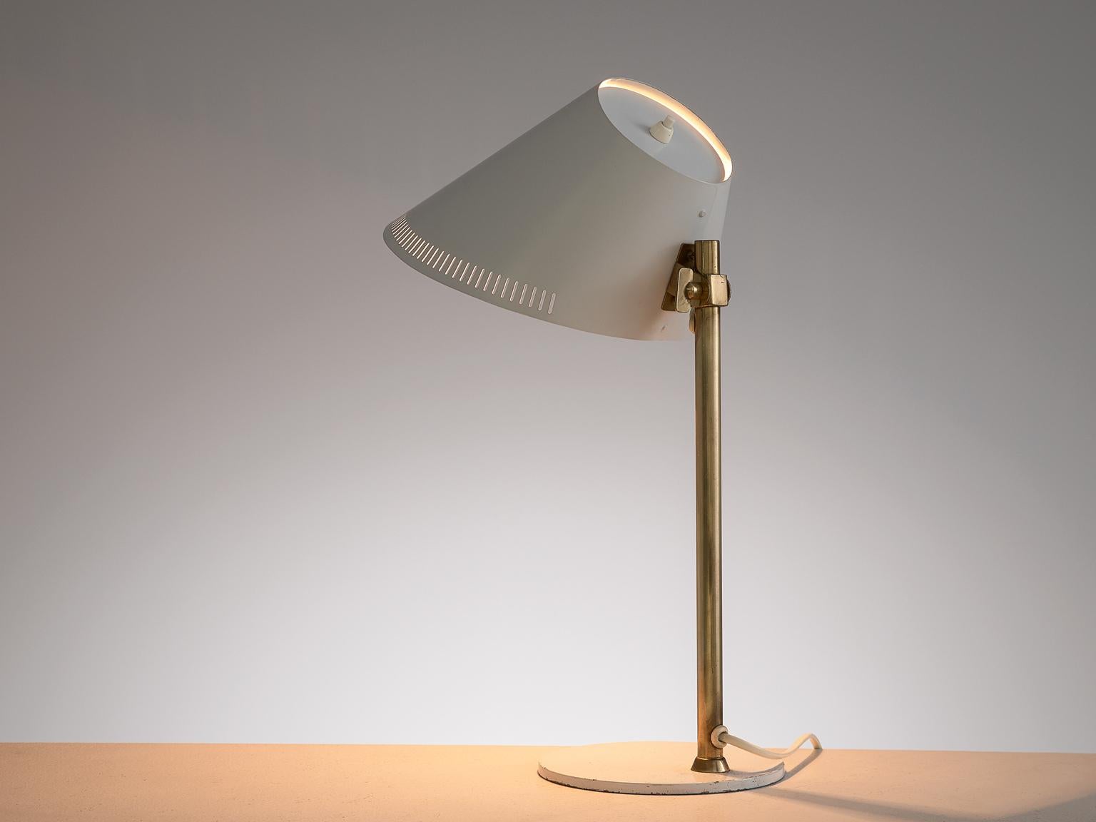 Paavo Tynell for Idman, desk light, white enameled metal and brass, Finland, 1950s.

Beautiful designed '9227' table lamp by Finnish designer Paavo Tynell for Idman. This model features a very refined design that shows Tynell's style perfectly.