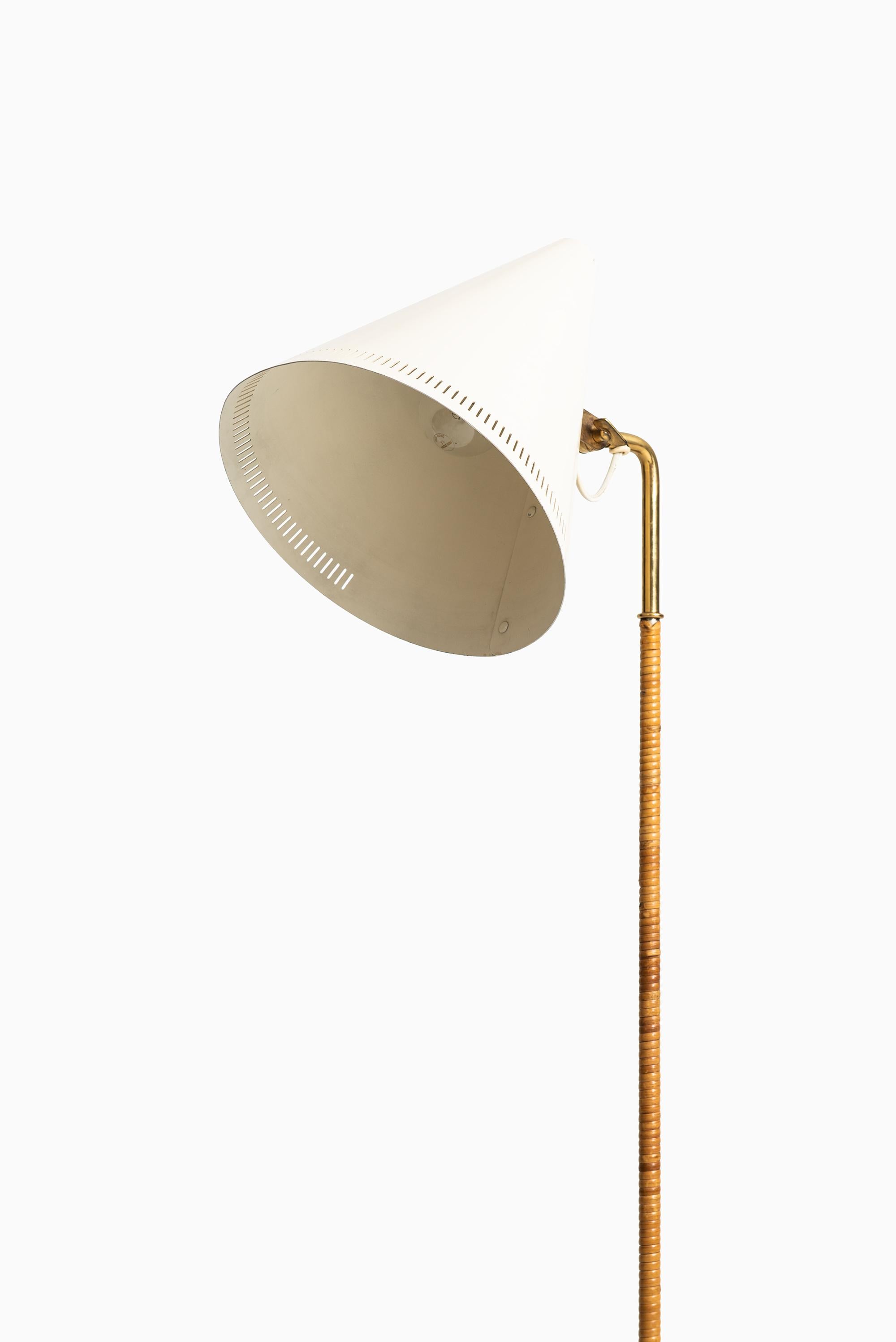 Scandinavian Modern Paavo Tynell Early Floor Lamp Model K-10-10 by Taito Oy in Finland