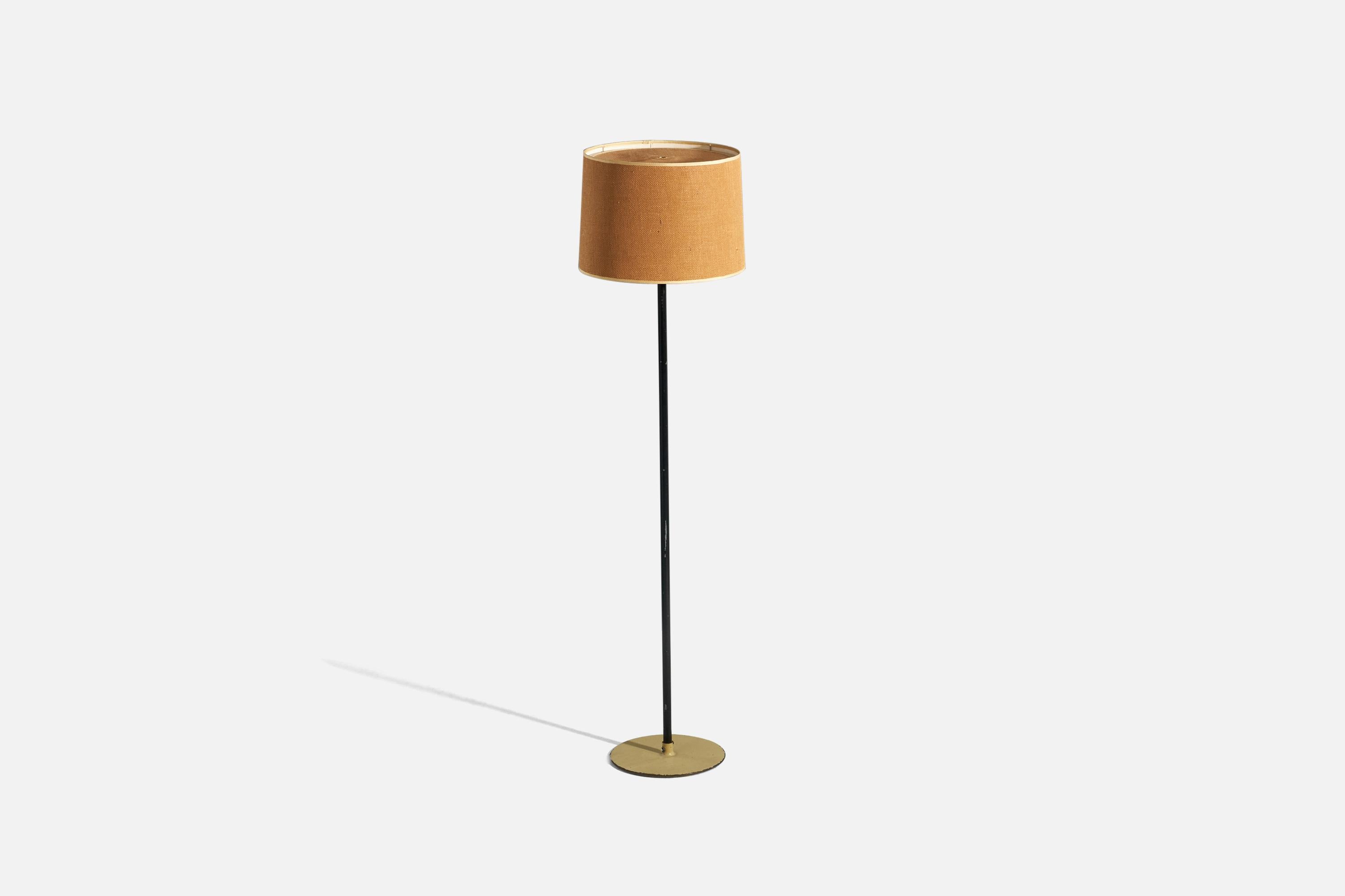 A lacquered metal, brass and raffia floor lamp designed by Paavo Tynell and produced by his firm Taito, Finland, 1950s. 

Sold with Lampshade(s). 
Stated dimensions refer to the Floor Lamp with the Shade(s). 

Socket takes standard E-26 medium base