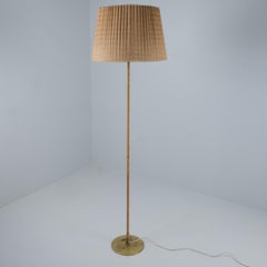 Paavo Tynell Floor Lamp Model 9627 in Rattan and Brass Taito 1950s