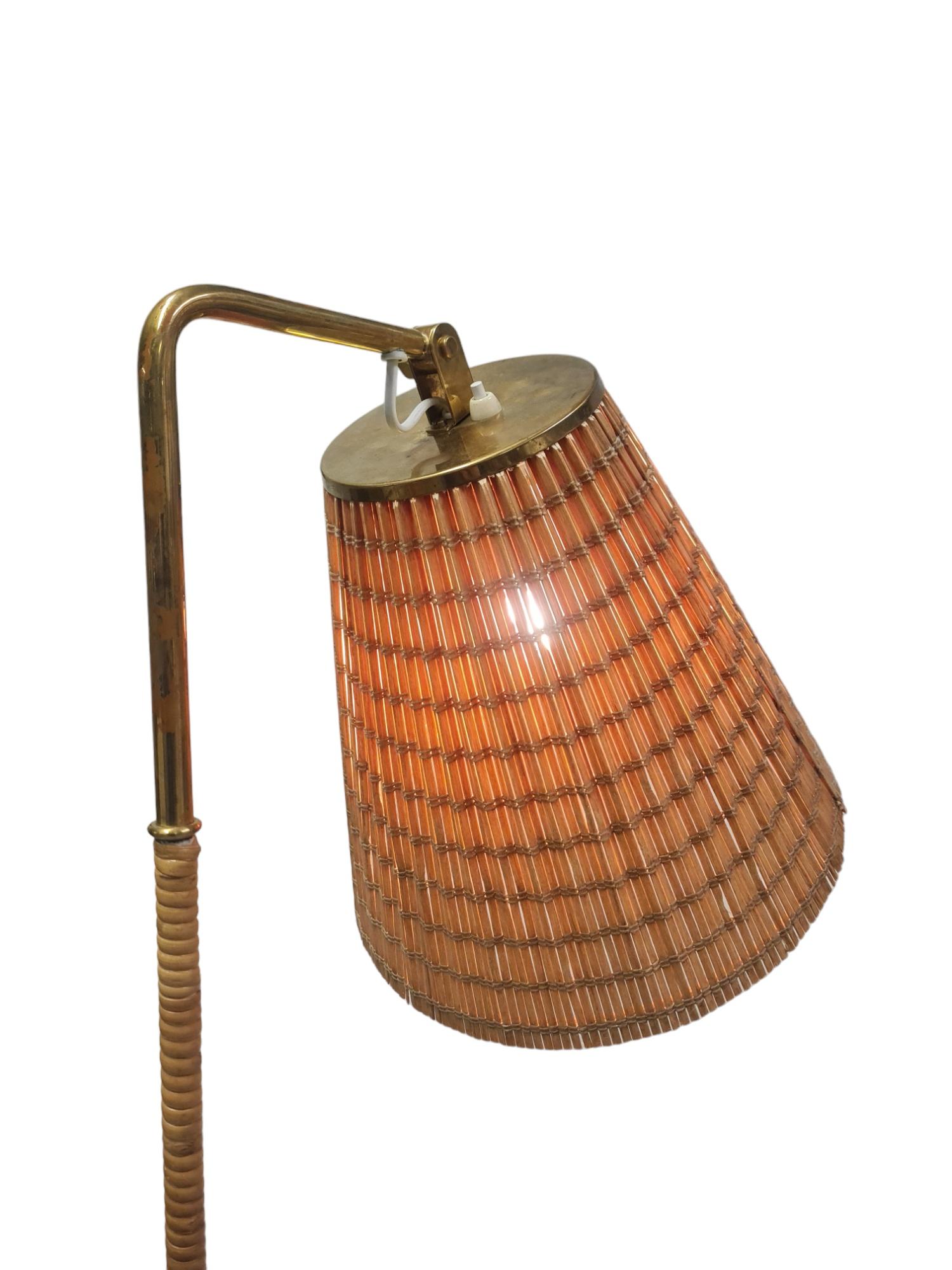 A very rare, but one of the best and most iconic floor lamps by Paavo Tynell. This model 9631 lamp is in great original condition straight from the 1950s, apart from the wires and shade which have been changed. The lamp shade is of course made