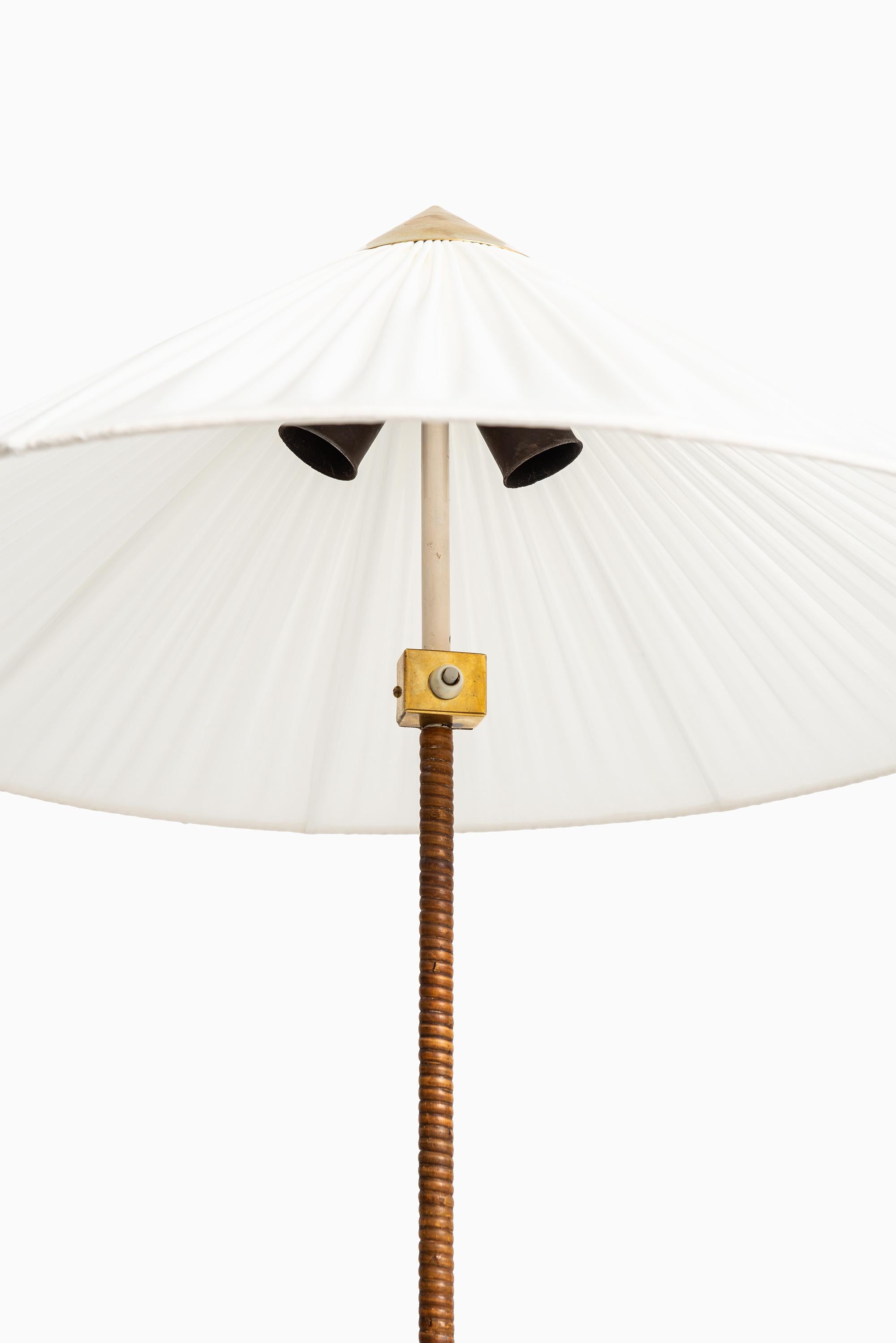 Scandinavian Modern Paavo Tynell Floor Lamps Model 9602 / Chinese Hat by Taito Oy in Finland