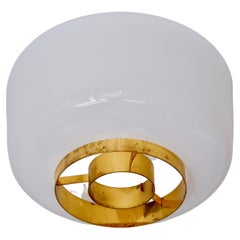 Paavo Tynell flush mount model A2-7 for Idman, brass & opal glass, circa 1960.