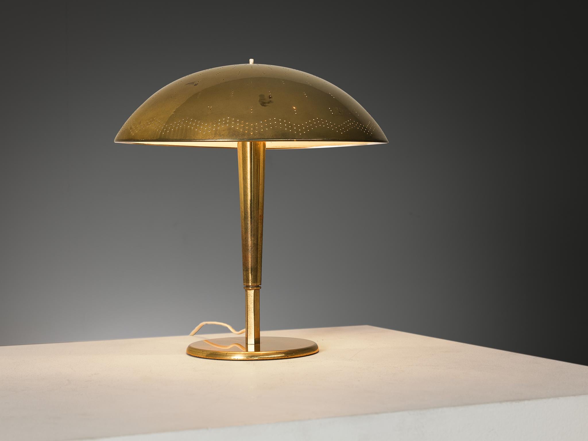 Paavo Tynell for Idman, table lamp, model ‘5061’, brass, Finland, circa 1950

A truly magnificent piece that scores highly on every design aspect: execution, material use, craftsmanship, and detail. Paavo Tynell, the master in the fields of