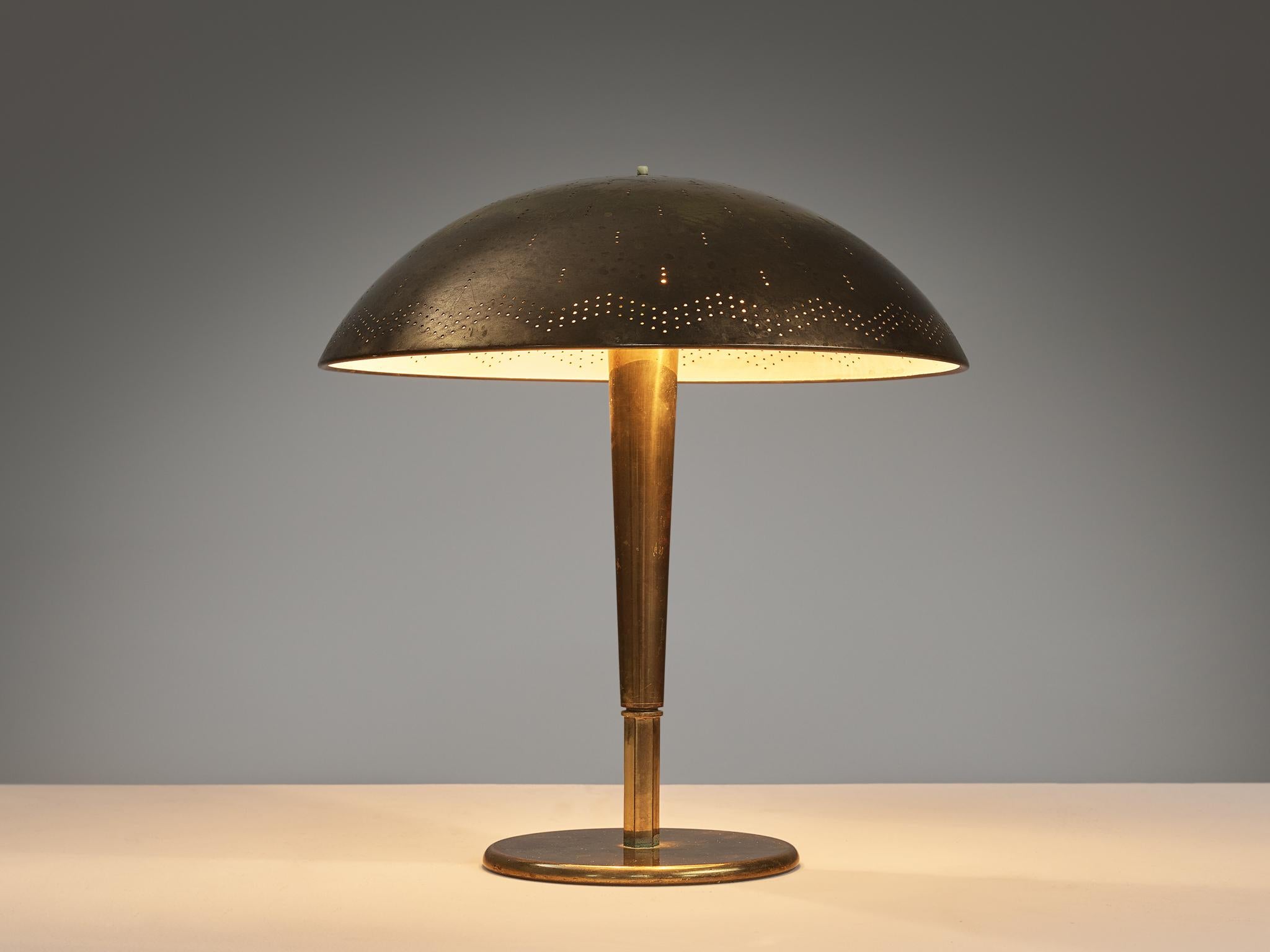 Paavo Tynell for Idman, table lamp, model ‘5061’, brass, perforated brass, Finland, circa 1950 

A truly magnificent piece that scores highly on every design aspect: execution, use of materials, craftsmanship, and detail. Paavo Tynell, the master in