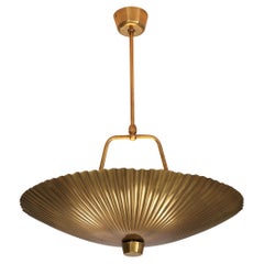 Paavo Tynell for Idman Rare Pendant Lamp with Textured Surface in Brass 