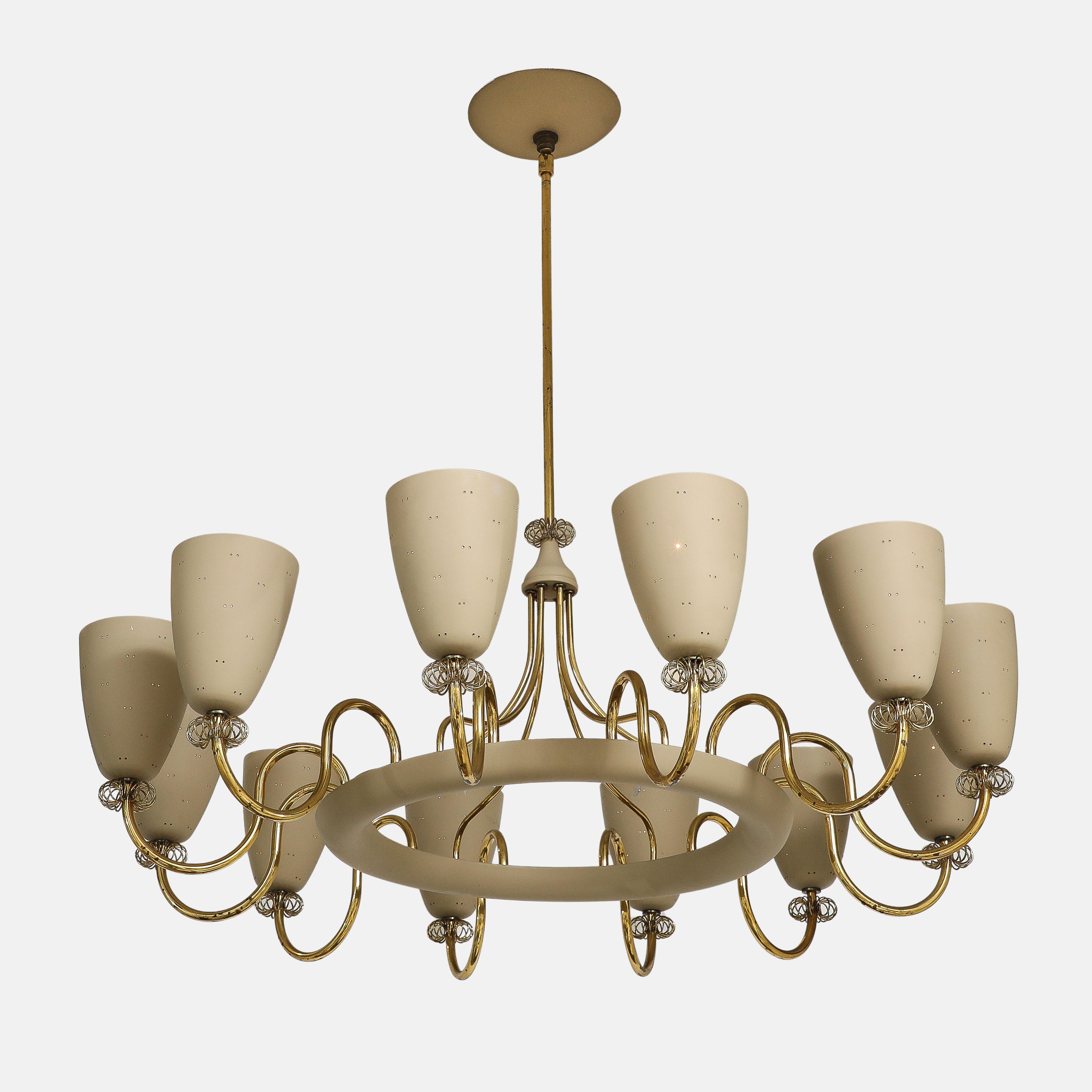 Paavo Tynell for Lightolier rare and exquisite twelve-light 'Ballerina' chandelier, Canada, circa 1958.  This classic chandelier has twelve elegantly curved brass arms each holding signature perforated spun aluminum matte beige painted shades with