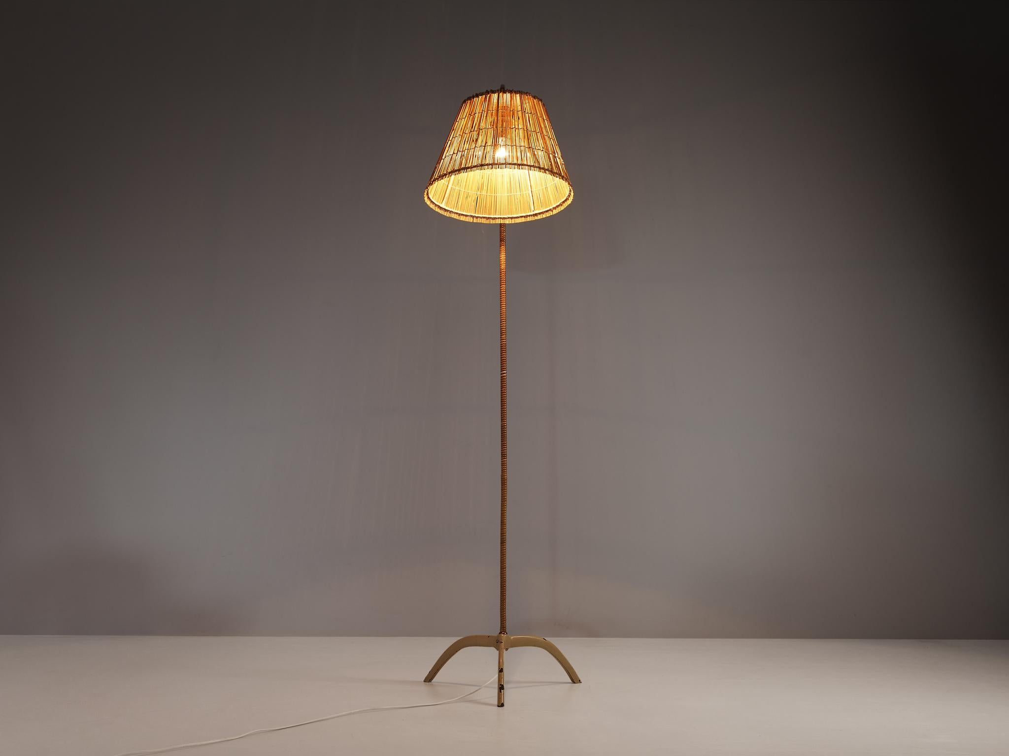 Mid-20th Century Paavo Tynell for Taito Floor Lamp in Brass and Cane